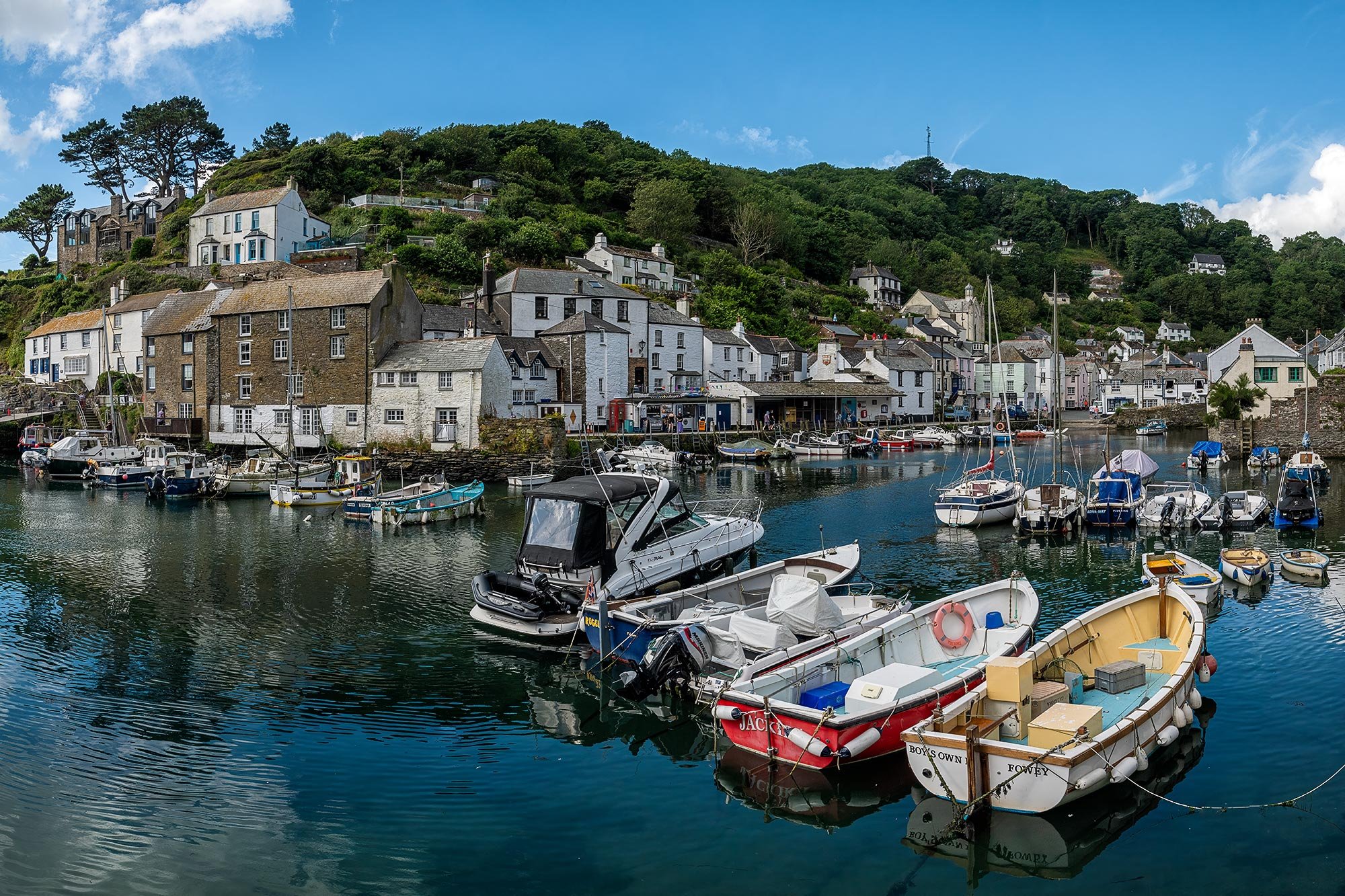 Fishing boats in the picturesque harbour at Polperro in Cornwall