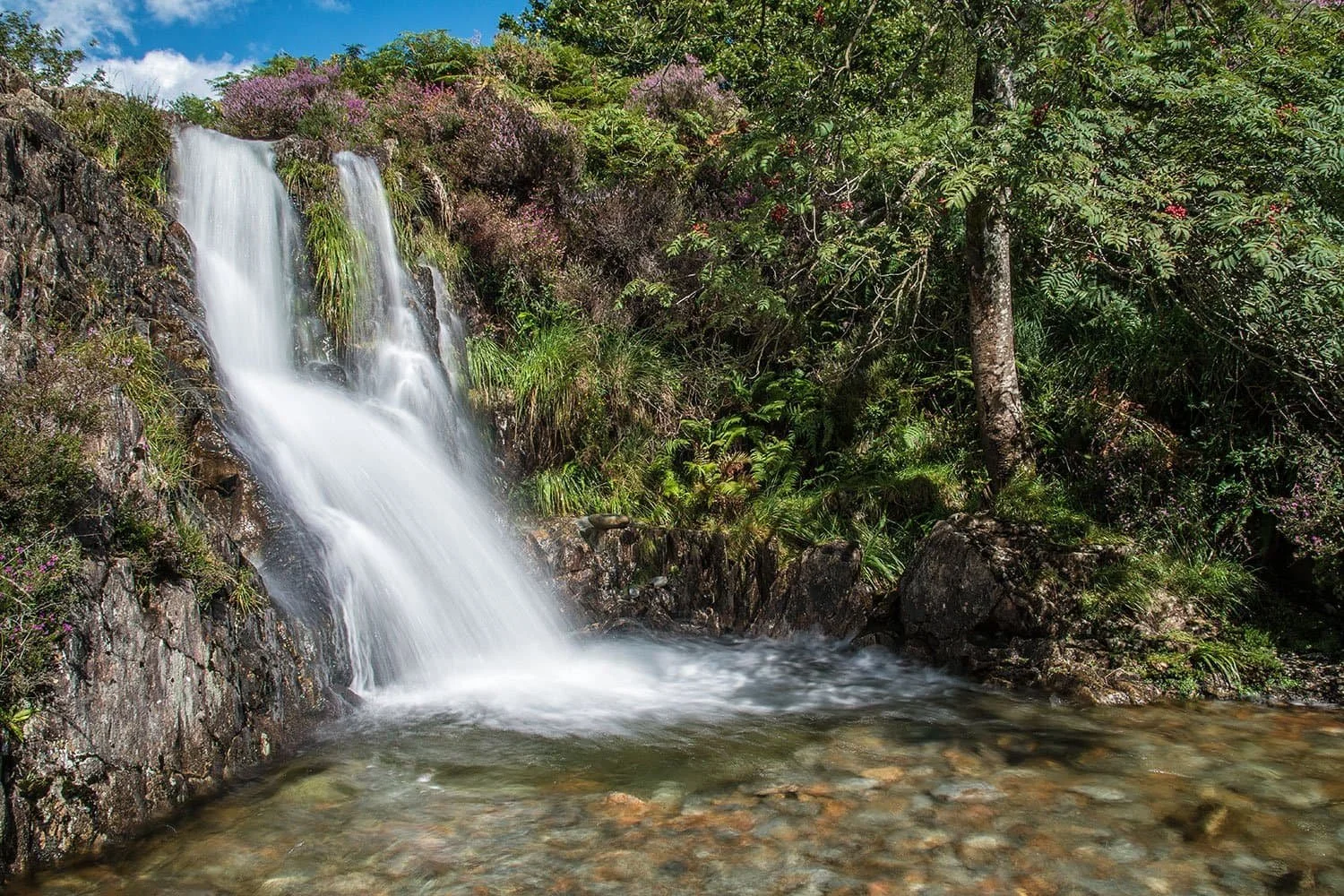 The hidden waterfall on the route through Cwm Bychan