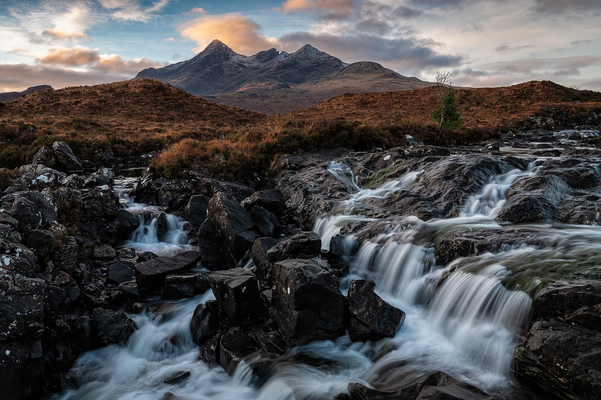 Black Cuillin waterfall at sunrise on the Isle of Skye