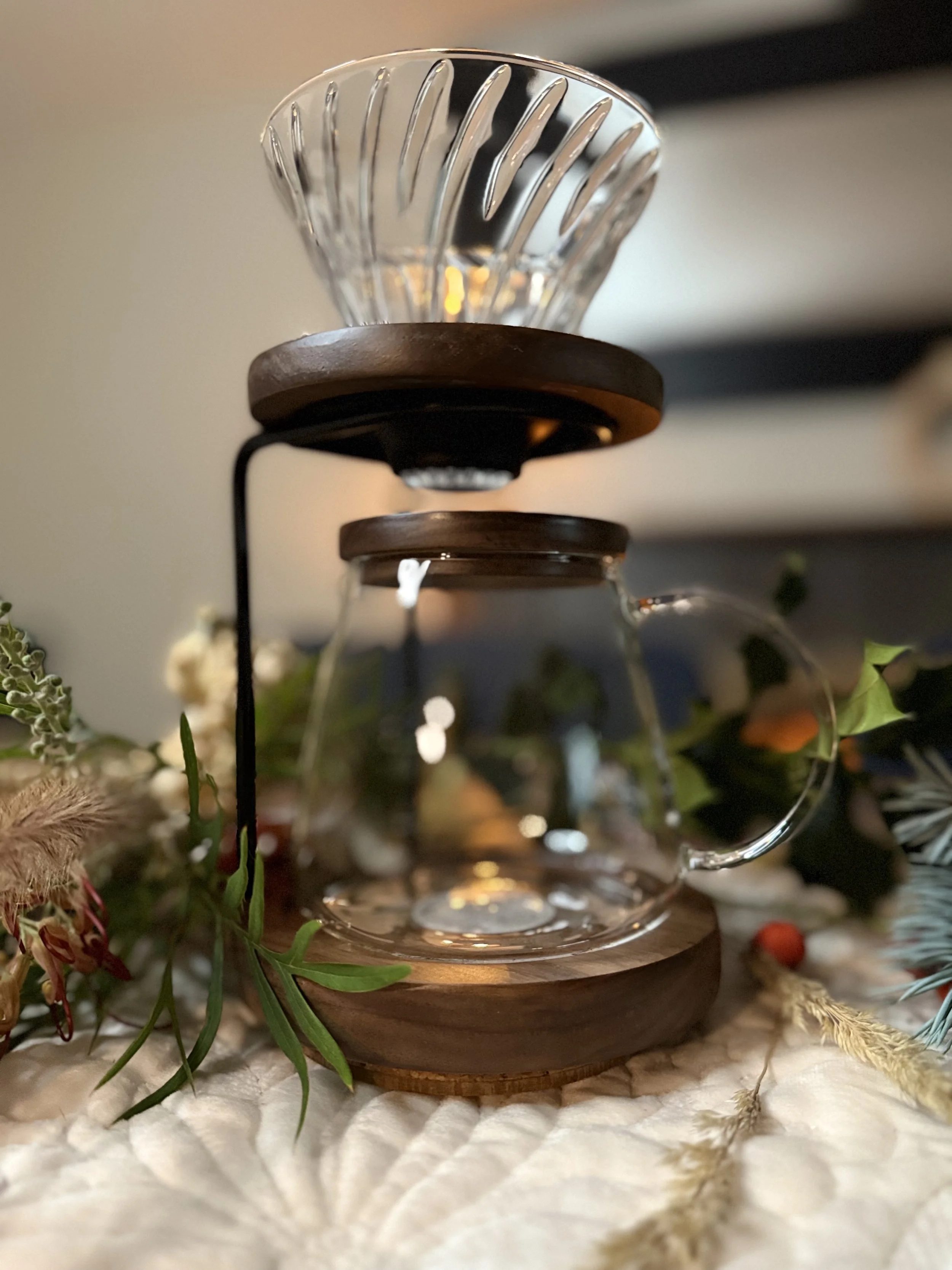 Detail of the Hario Walnut Drip Stand Set highlighting craftsmanship and stability for V60 brewing.