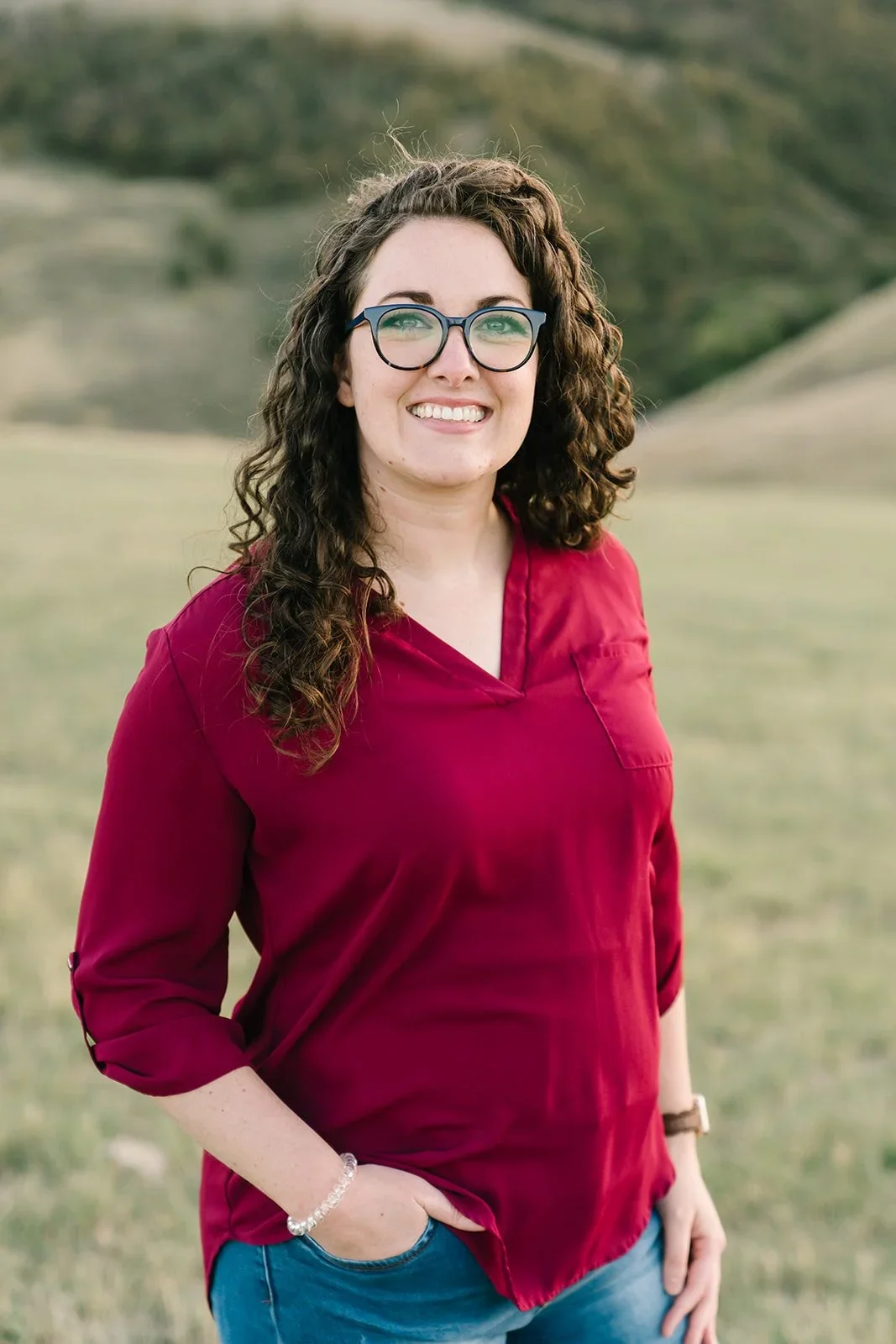 Smiling portrait of Amy Bowen, a therapist offering trauma informed therapy in Hyde Park, Utah -- near Logan and Cash Valley -- and throughout Rhode Island and Idaho.