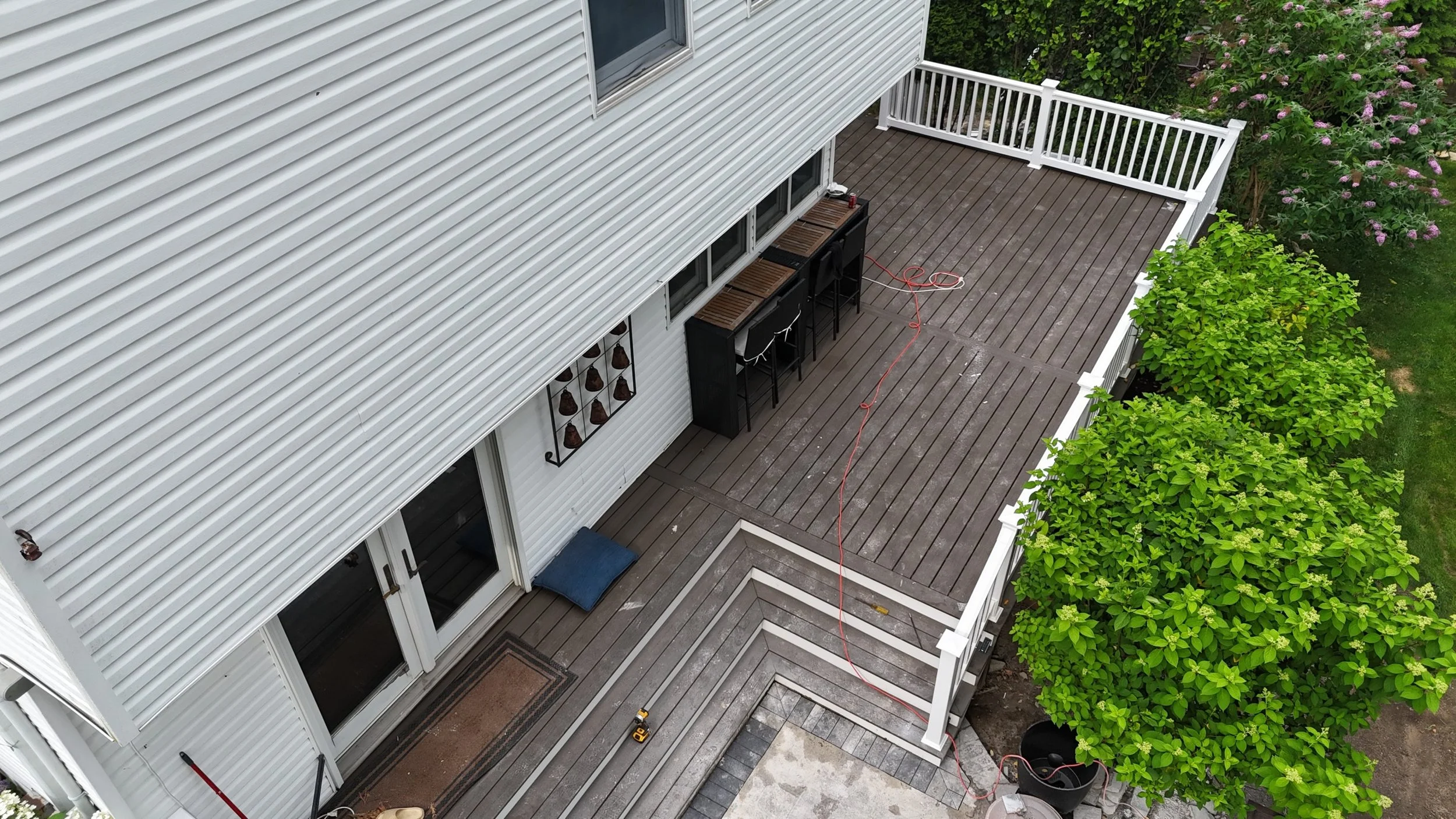 Installed trex and PVC railings.