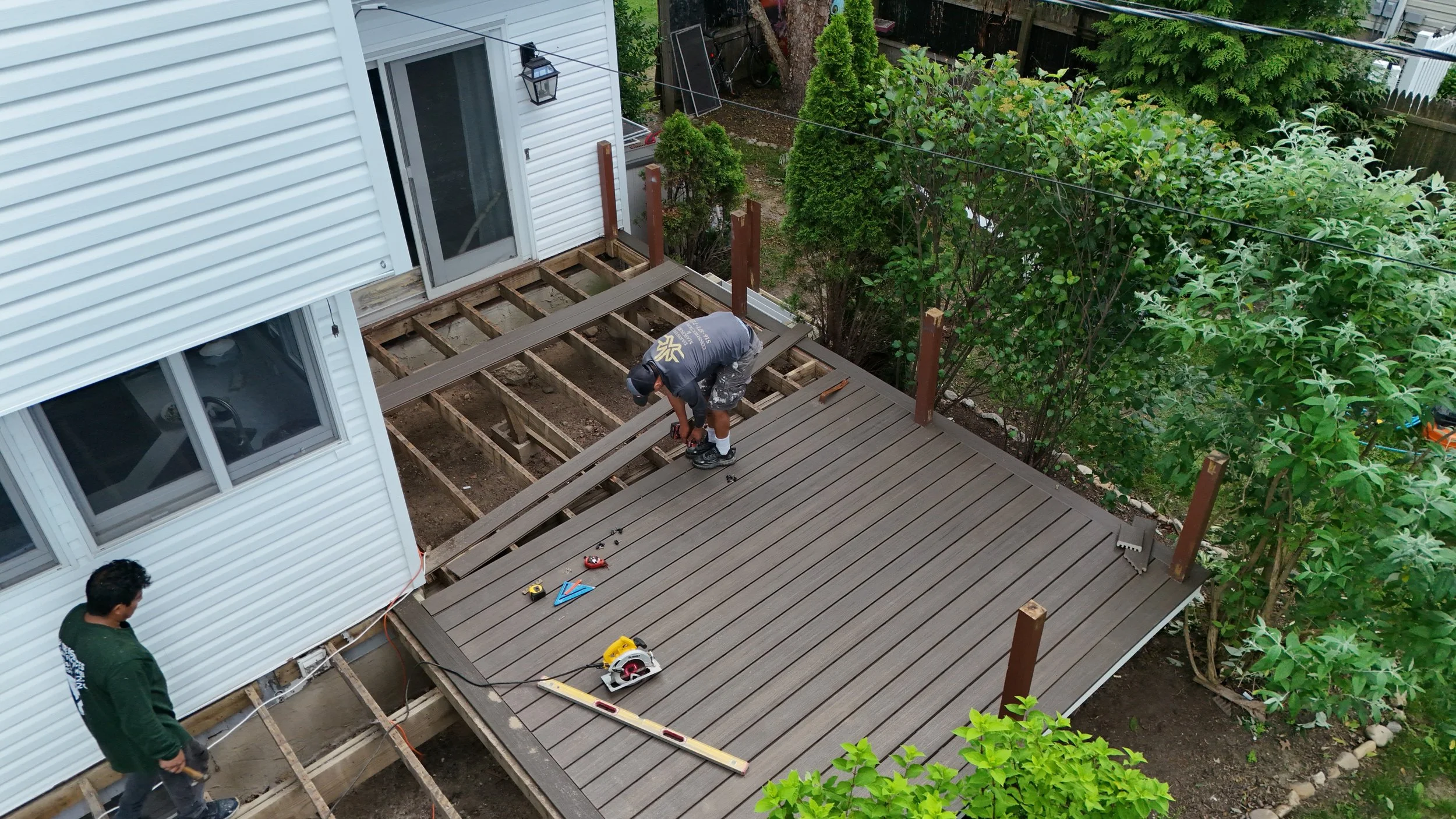 Installing trex on the deck.