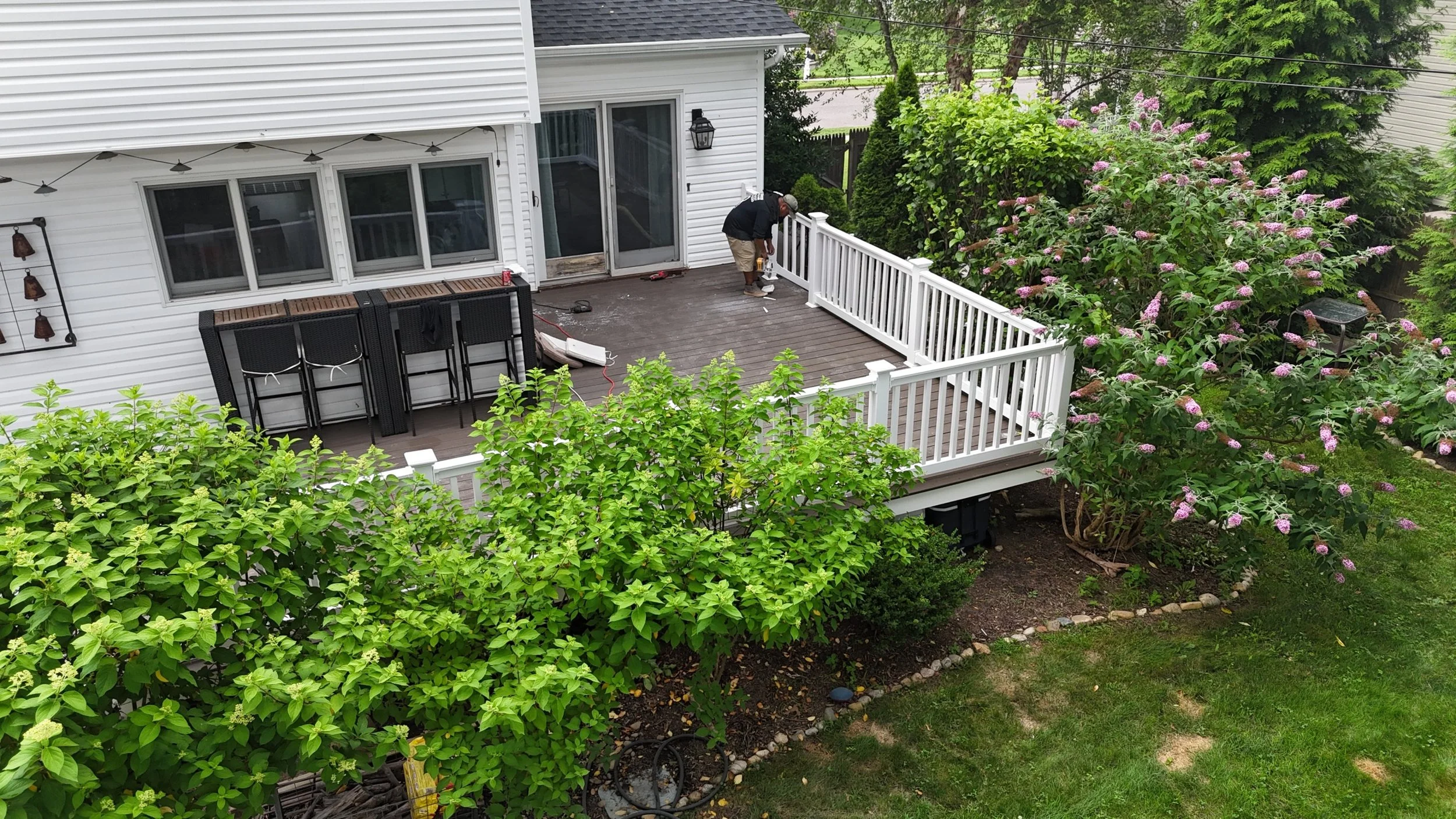 Installed trex and PVC railings.