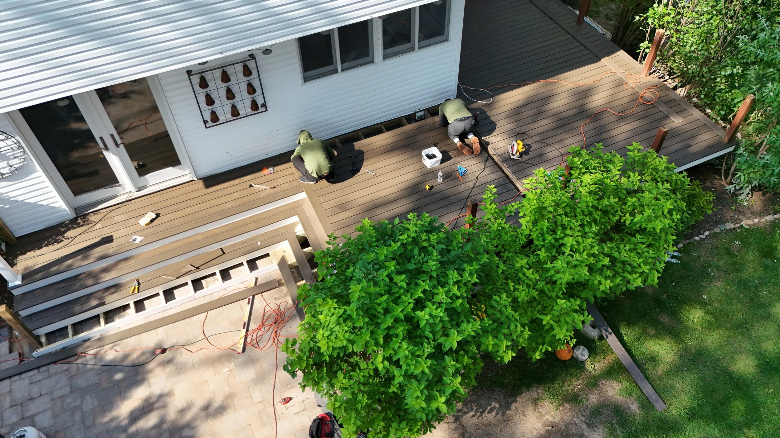Installing trex on the deck.