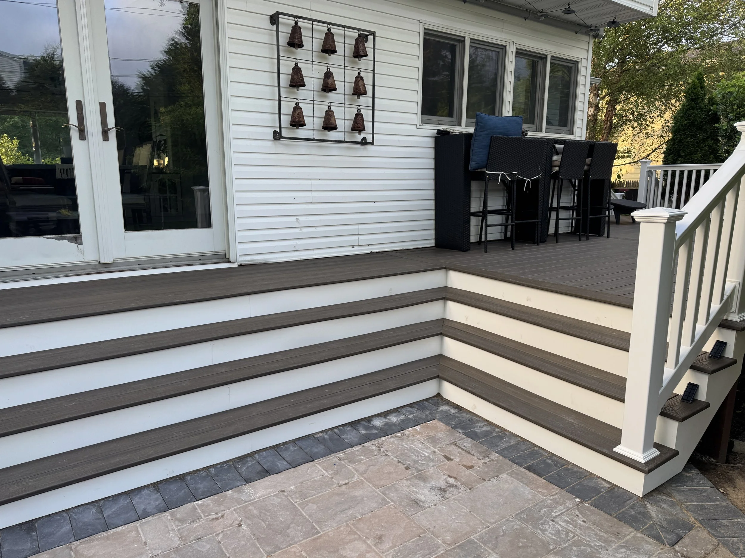Installed trex and PVC railings.