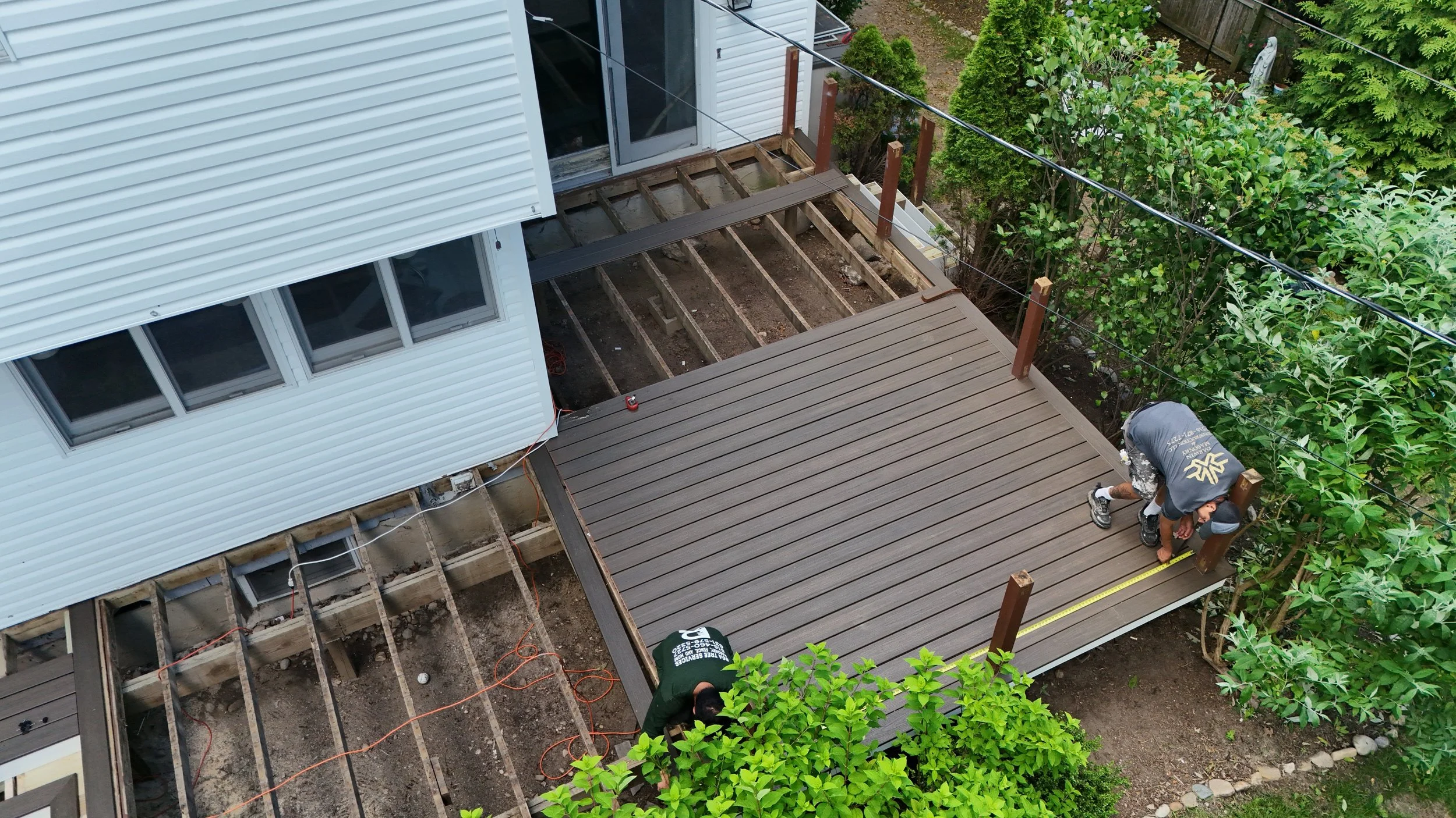 Installing trex on the deck.