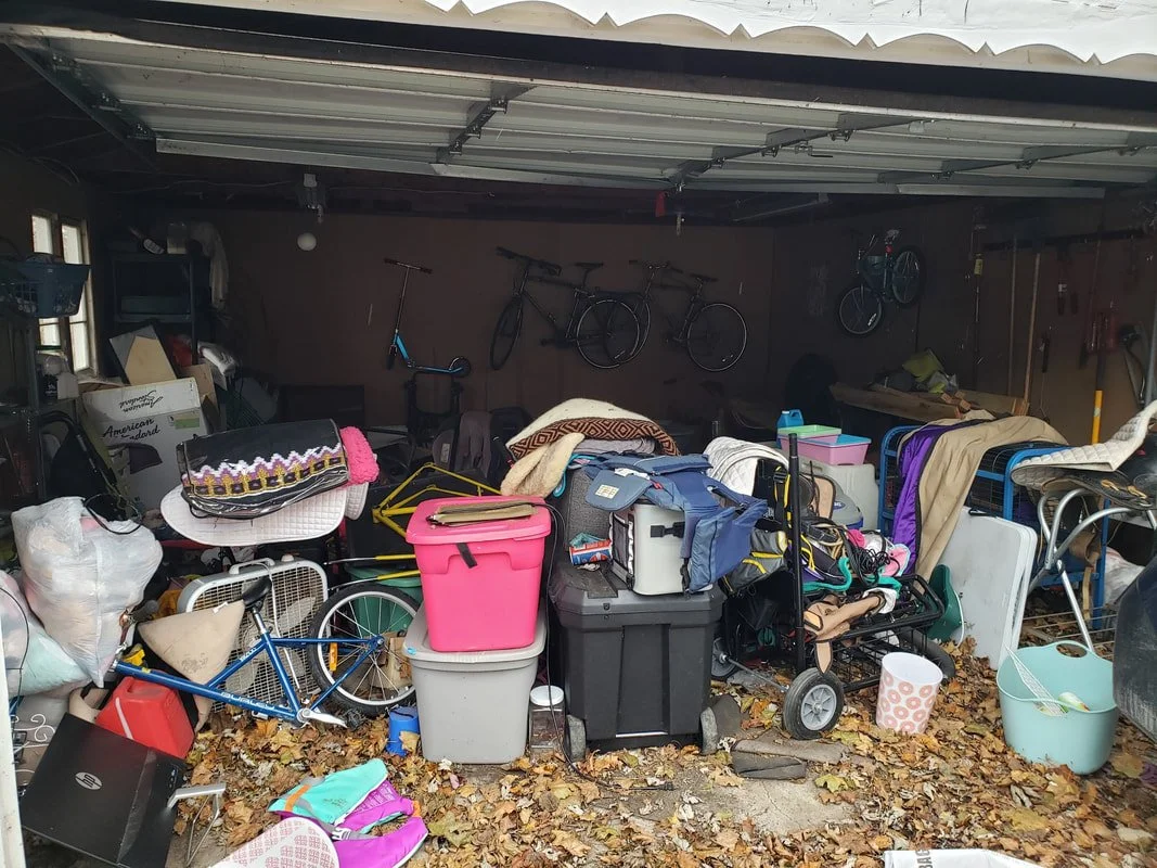 Before photo of garage clutter for professional decluttering service