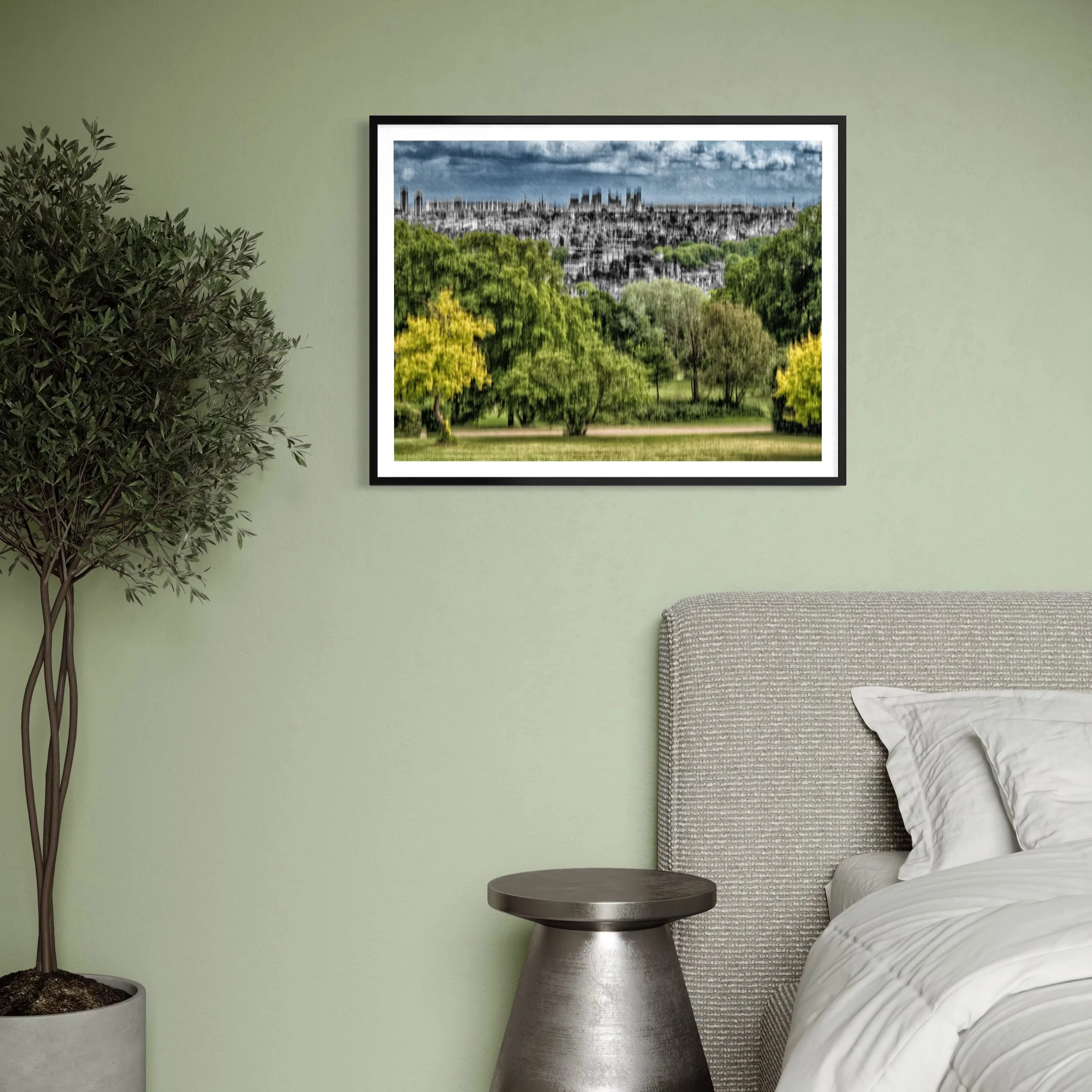 Abstract landscape artwork with green trees and a distant city skyline displayed above a bed in a soft green bedroom.
