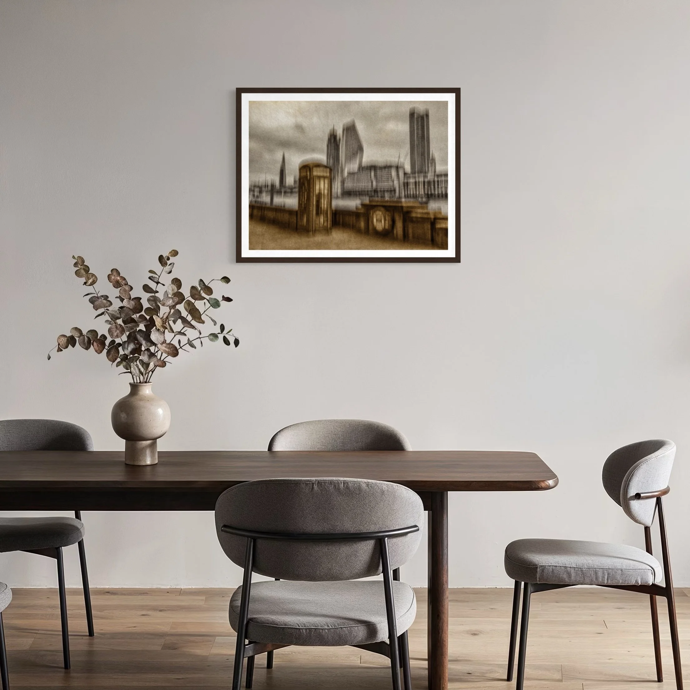 Sand and Grain – Duotone abstract ICM artwork in beige and grey displayed above a dark wood dining table in a minimalist dining room.