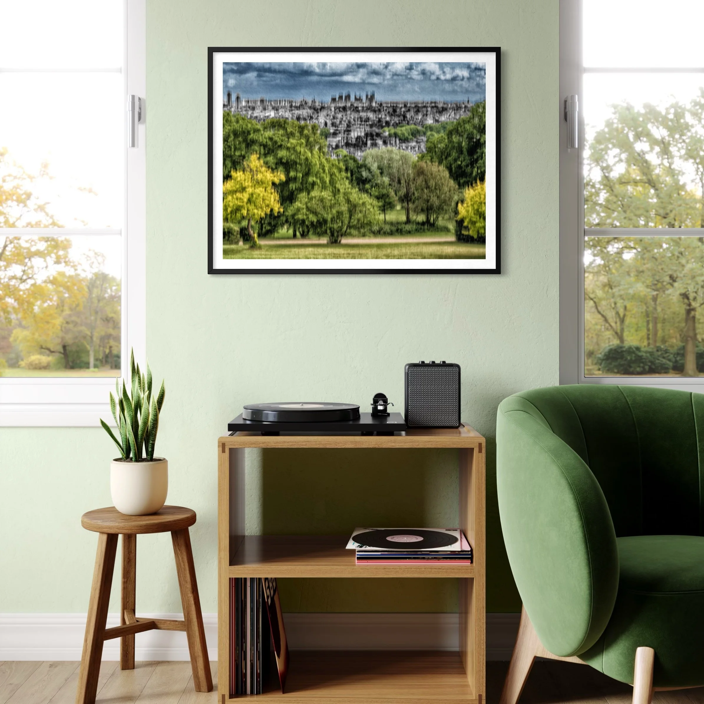 Abstract landscape artwork with green trees and a city skyline displayed above a record player in a green music room.
