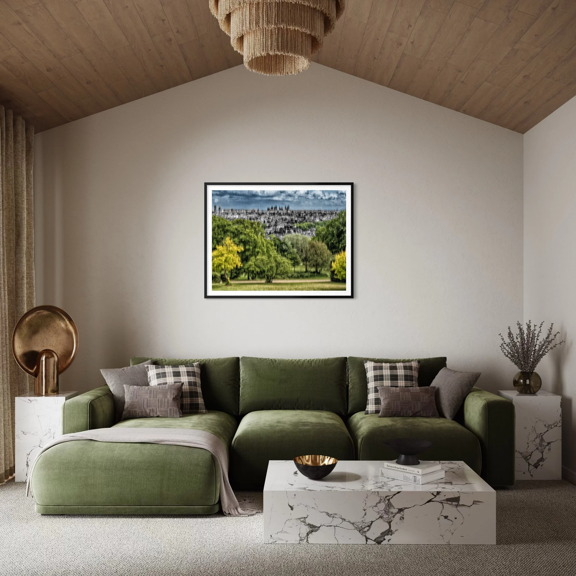 Abstract landscape artwork displayed above a green sofa in a contemporary living room with neutral decor