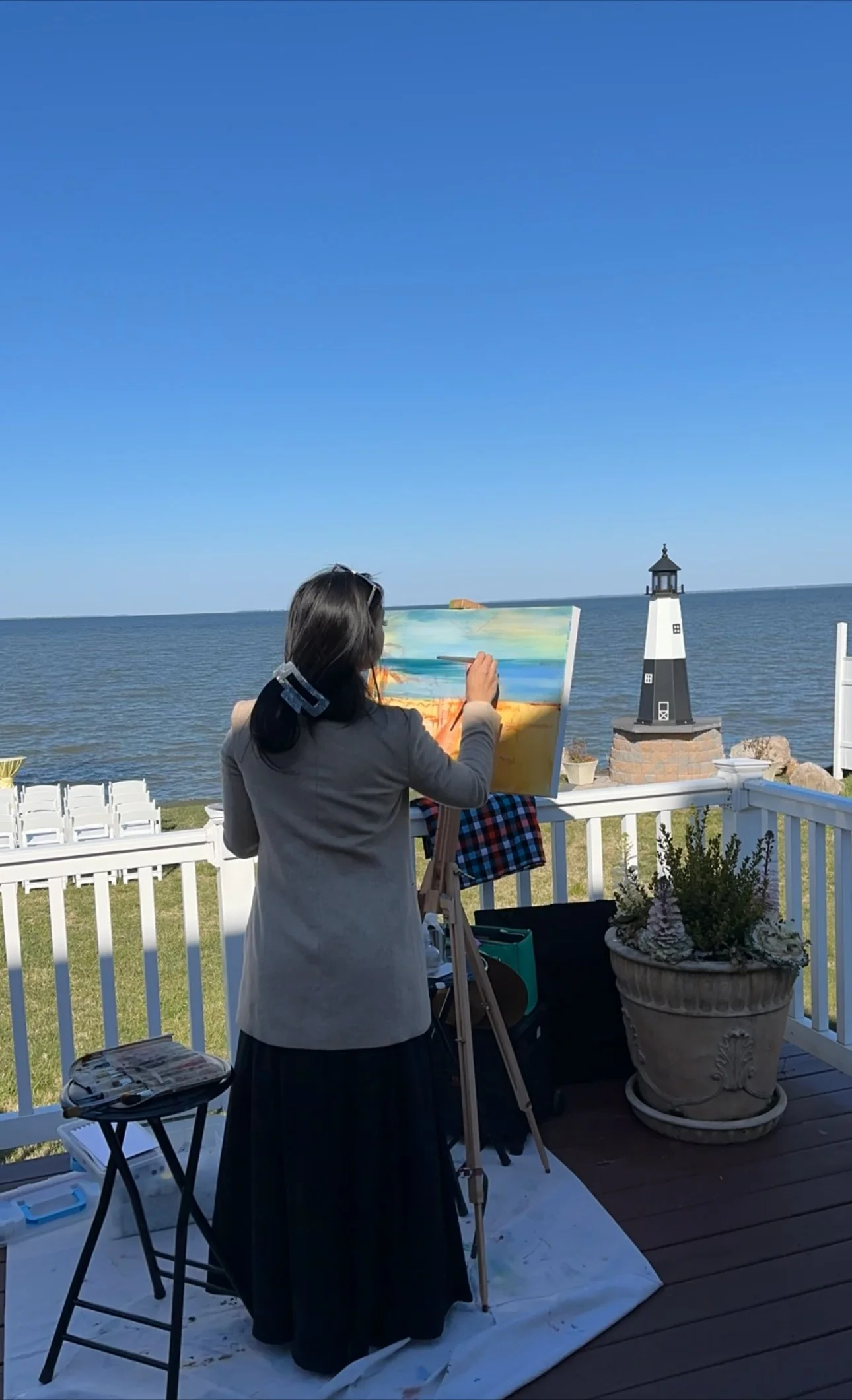 Pre-ceremony work: Painting background and planning composition.
