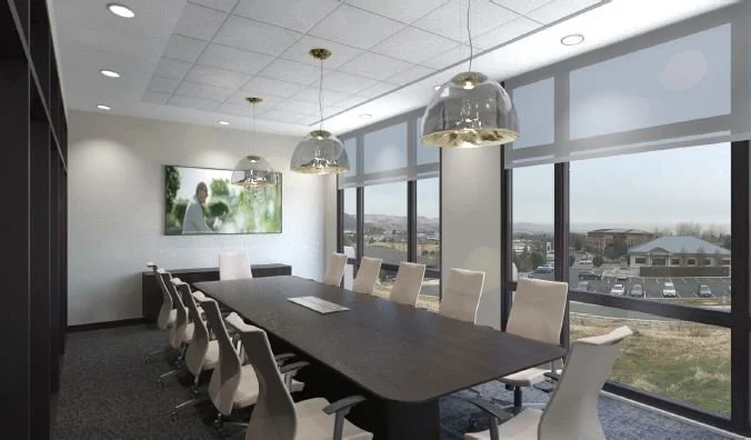A modern conference room with a long table, 10 chairs, large windows, and hanging pendant lights.
