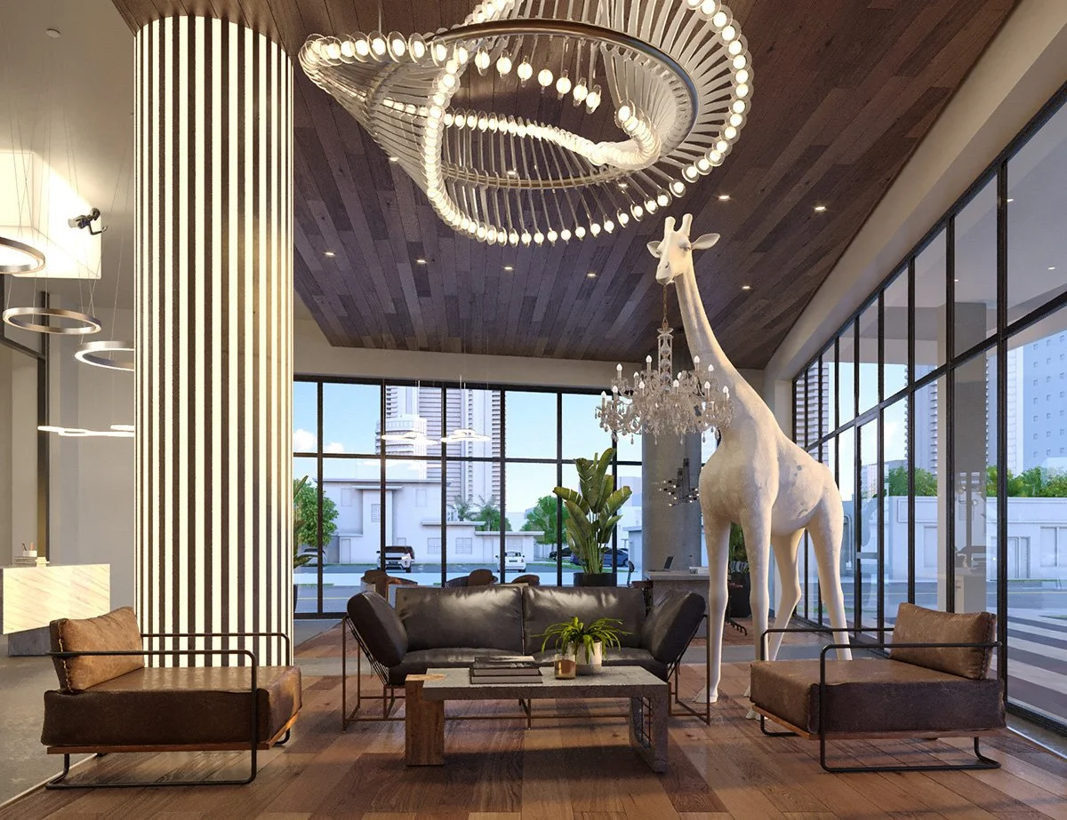 Modern hotel lobby with large windows, a giraffe sculpture, and contemporary furniture.