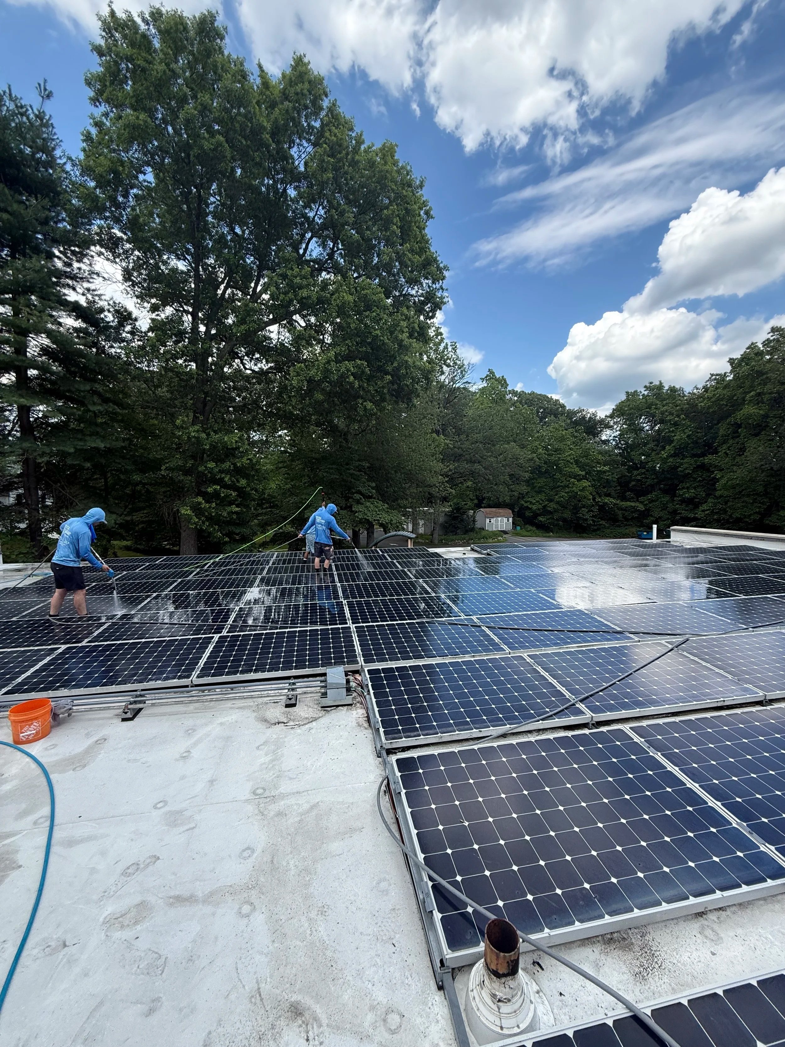 Solar Panel cleaning in New Jersey - Workers cleaning solar panels