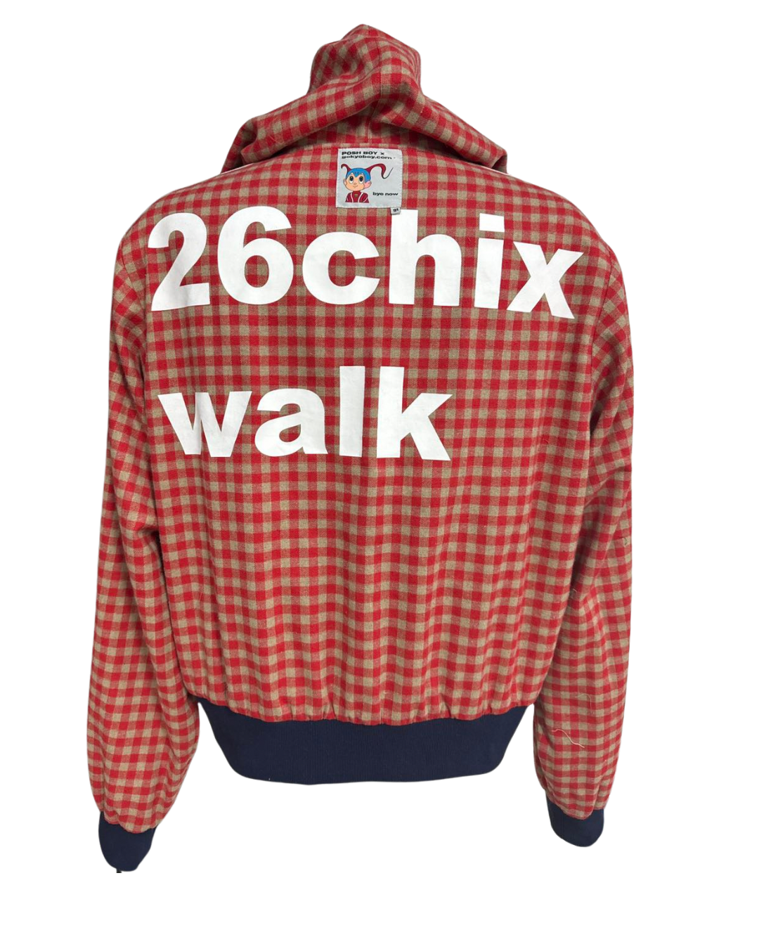Back of a red and beige checkered jacket with large white text that reads '26chix walk'.