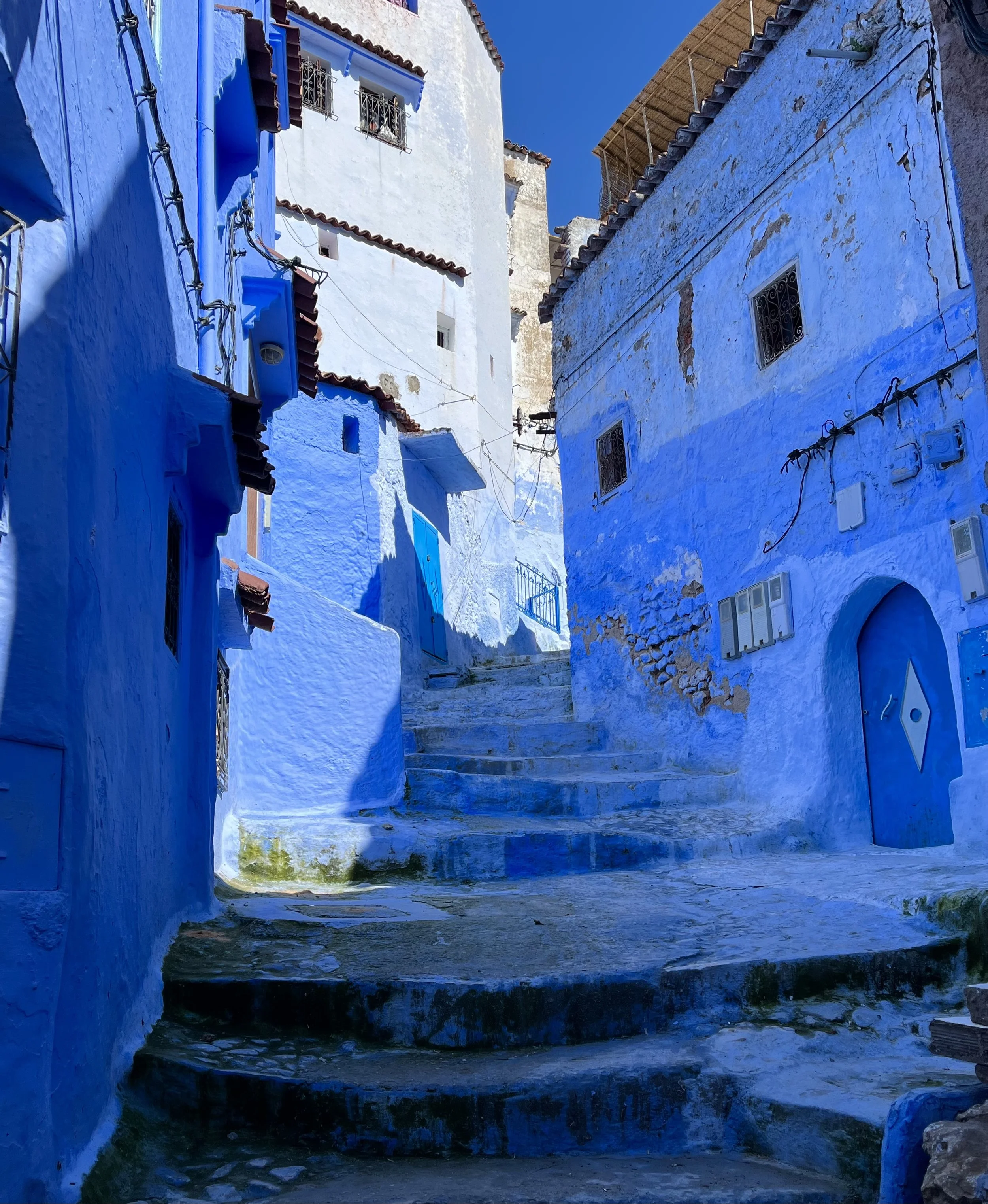 Blue-washed buildings and stairs in Chefchaouen, Morocco