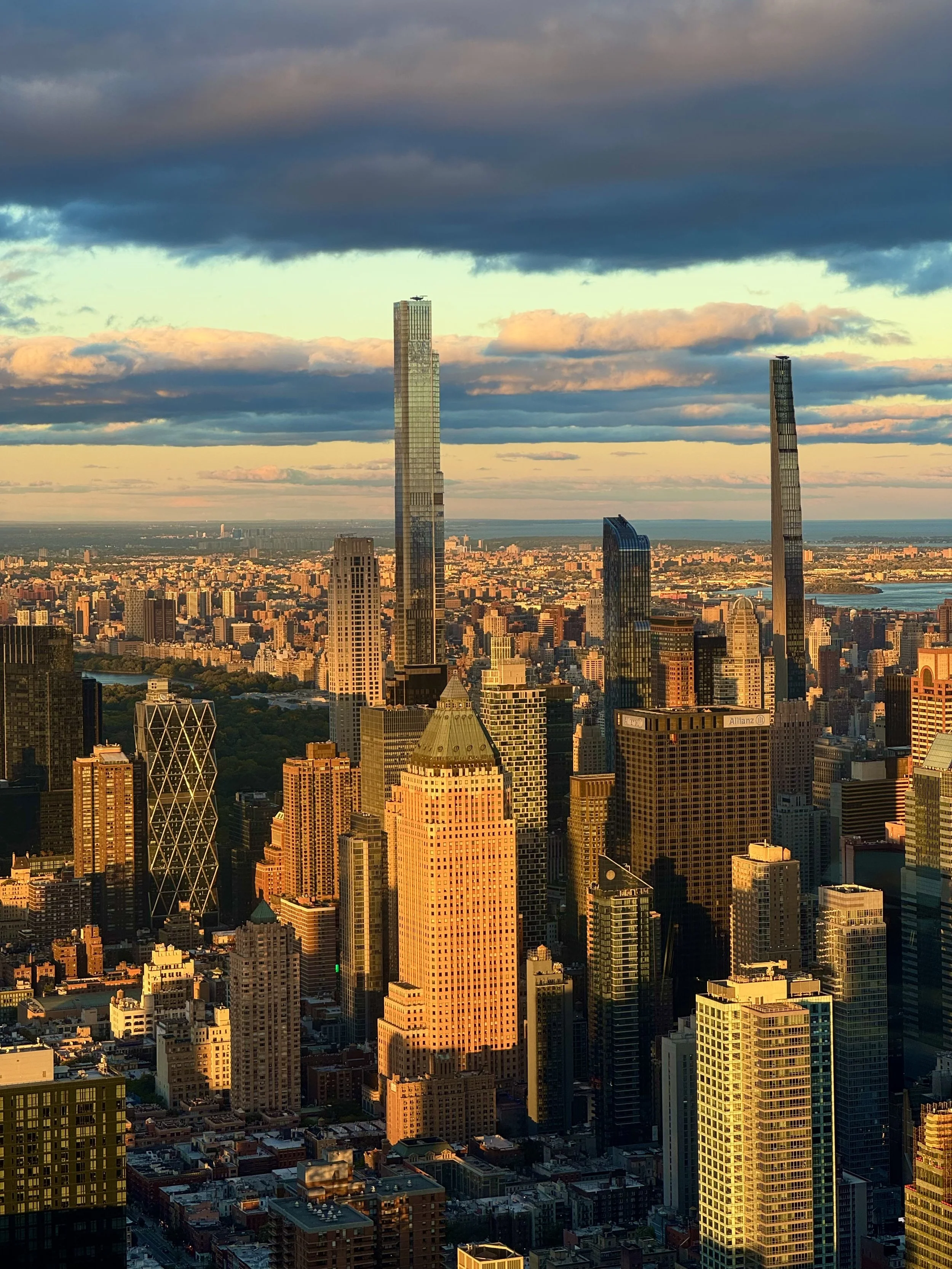 New York City skyline with tall skyscrapers and clouds