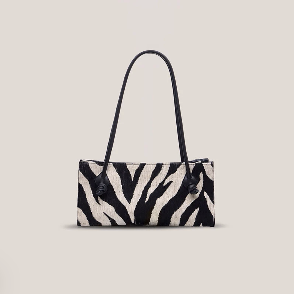 CABÁ | Ter East-West Bag Zebra | $570.00 CAD