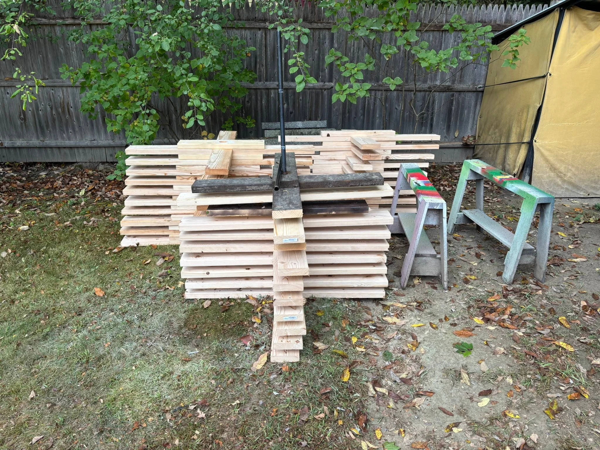 Thirty tree (not 33)stands constructed and primed. Now to paint final color and add mounting hardware. Stringing treee lights later this week.