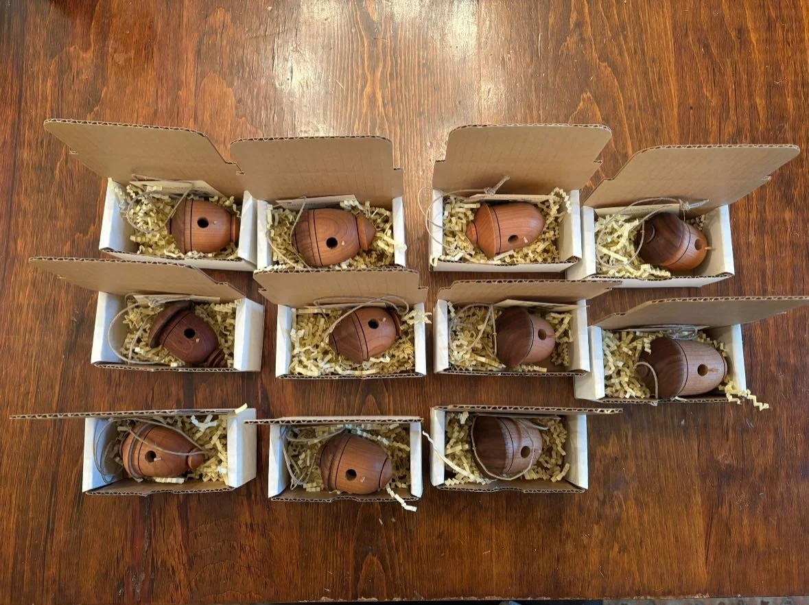 Tried calling in sick. Boss threatened to fire me! Got assigned packaging birdhouse ornaments.