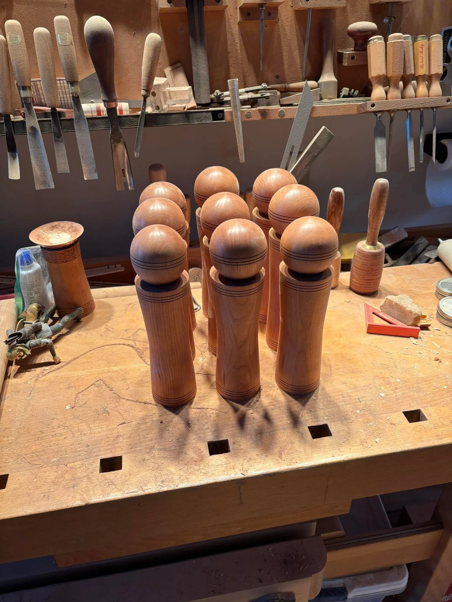 Nine more cherry grinder mills awaiting final assembly and finishing. That should be it for the 2025 grinder season. Over the last several months I have probably turned 50 or so of these. Even Legolas is tired (left side).

Off to work on some non-la