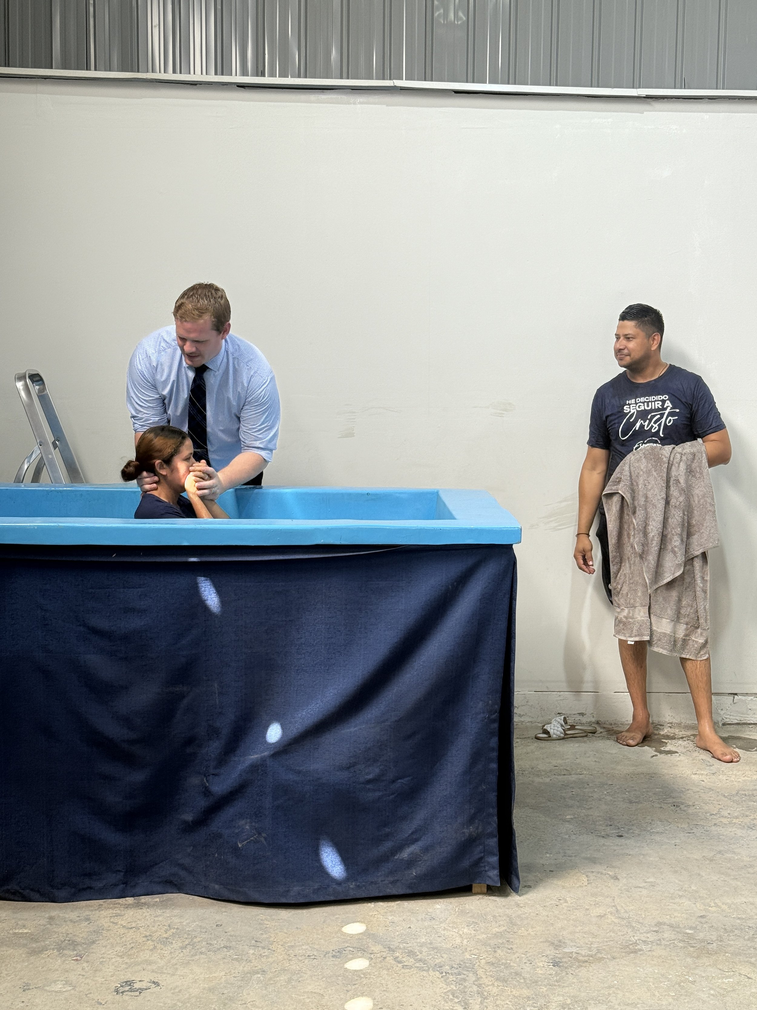 Simon and Mary getting baptized.JPG