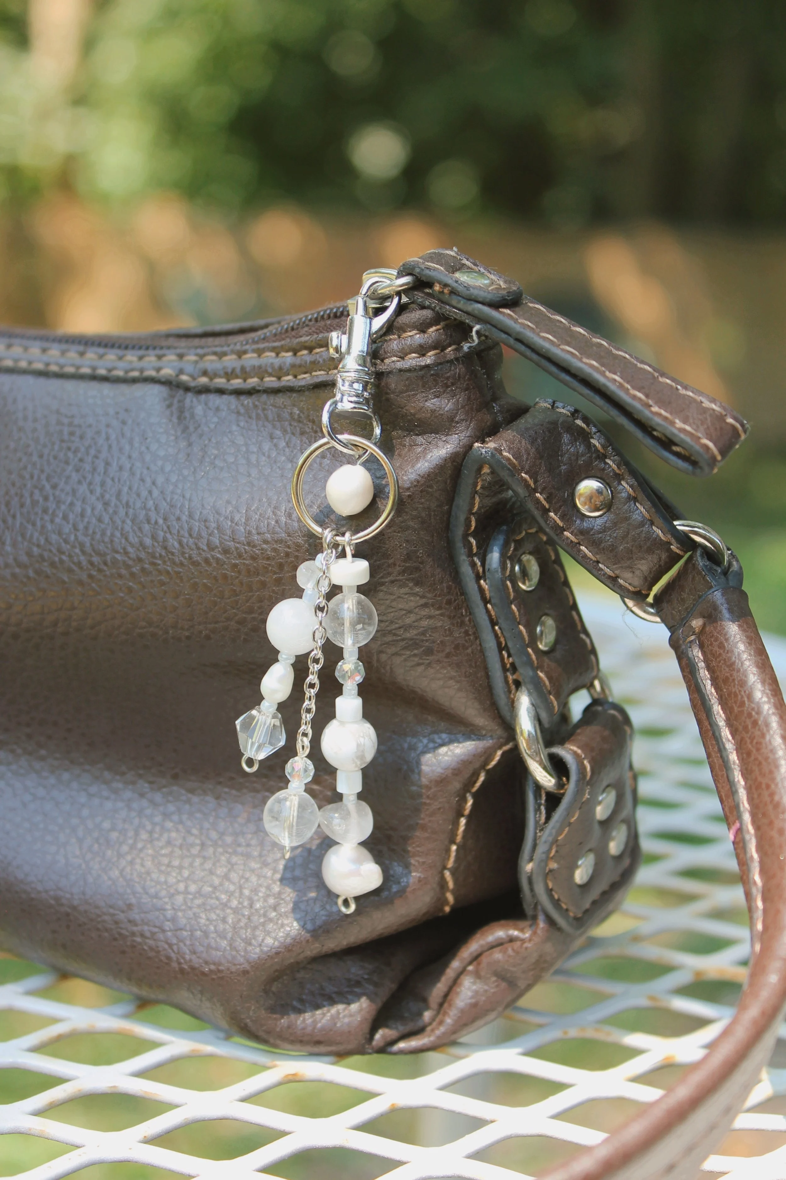 "Crystal Clear Clouds" Bag Charm in Silver Finishings- $20 | Stones: Clear Quartz, Uncultured Pearl, Howlite