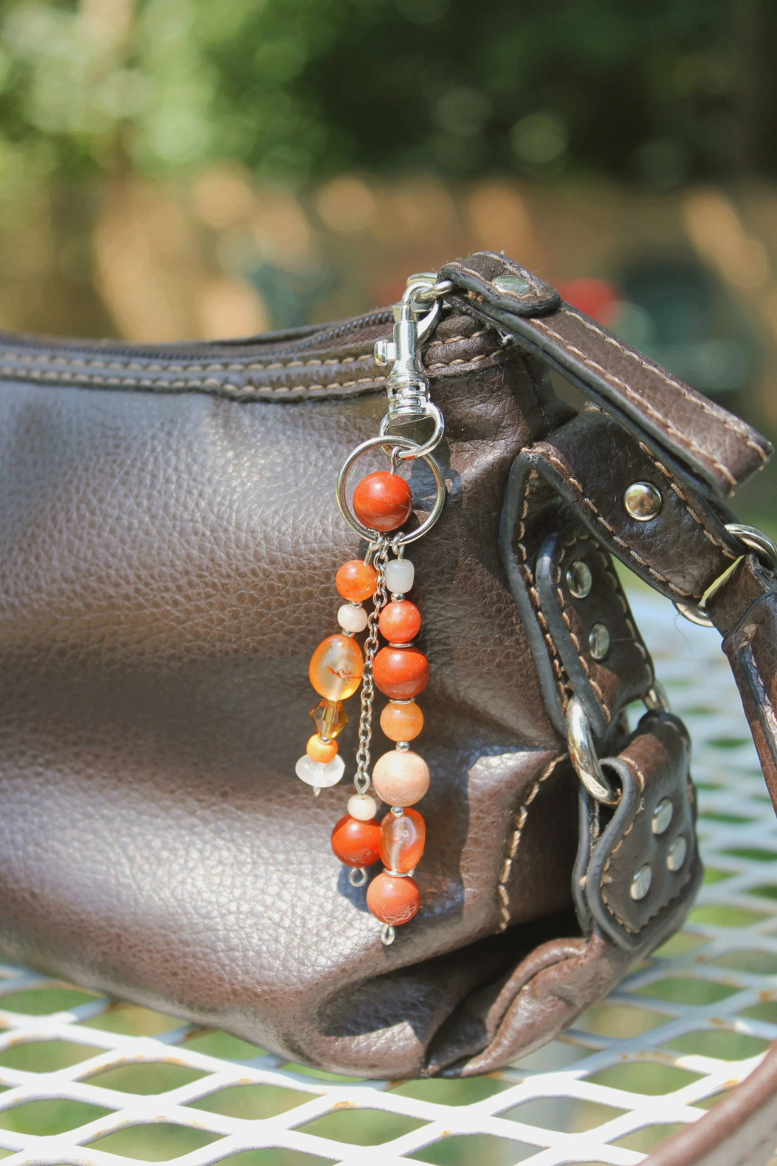 "Orange Peels" Bag Charm in Silver Finishings - $20 | Stones: Red Jasper, Carnelian, Yellow Imperial Jade, Clear Quartz