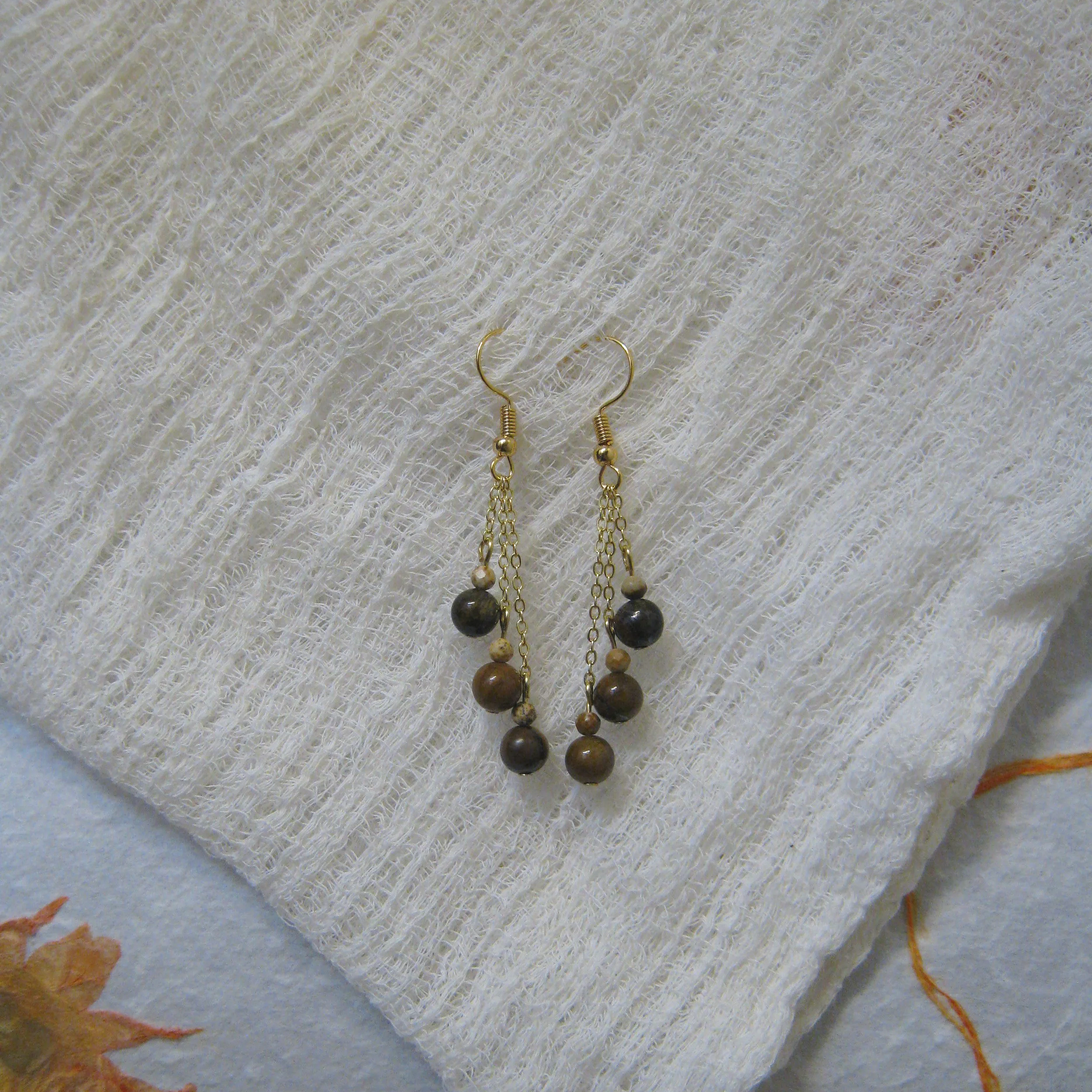 Tigers Eye & Brown Jasper Dangle Trio Earrings - $12 | Tigers Eye is associated with courage, strength, and protection. It provides clarity and vision and is known for having grounding energy and vitality. Brown Jasper harnesses the power to make ind