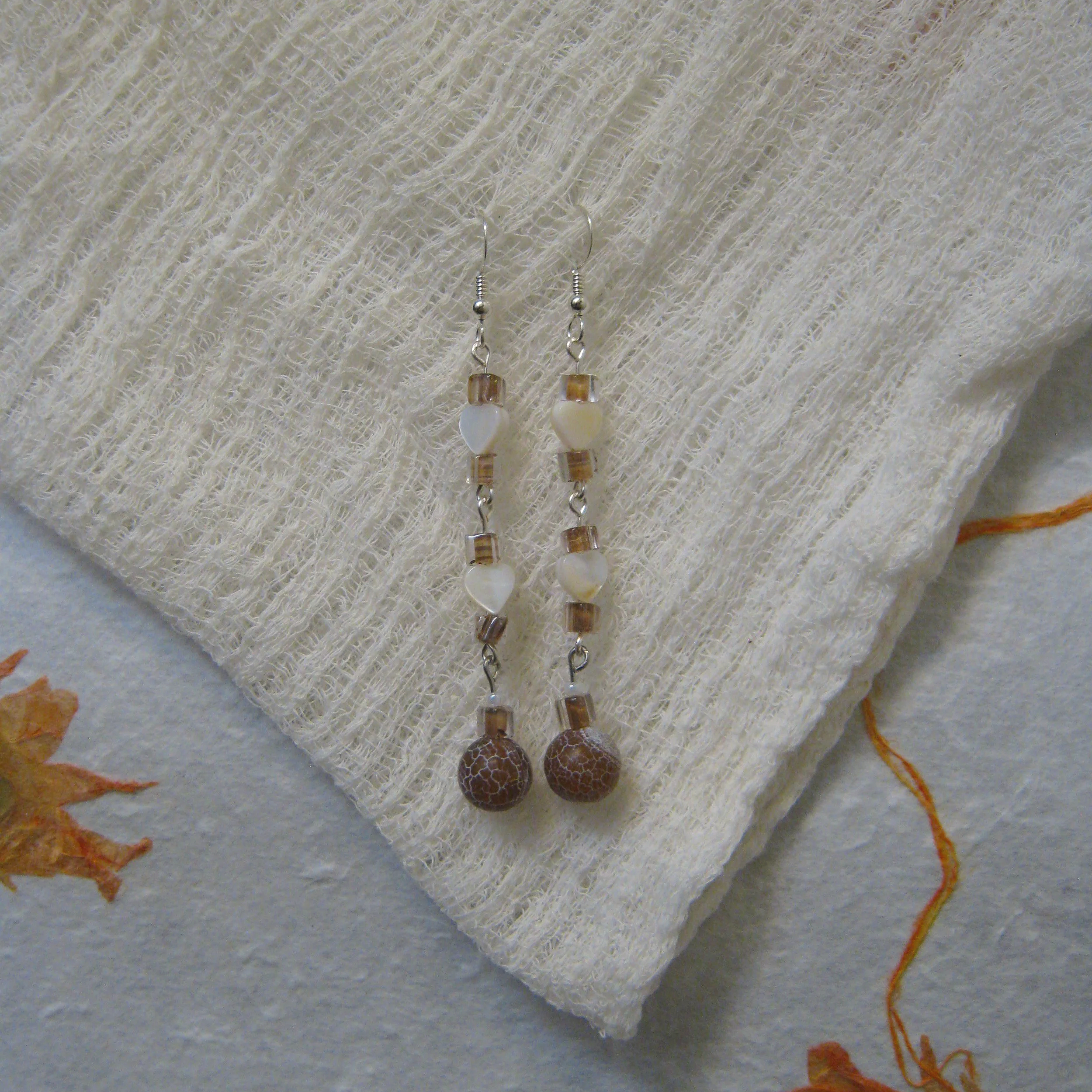 Crackled Agate & Mother of Pearl Dangle Drop Earrings - $12 | Brown Agate symbolizes grounding, stability, and balance.  Mother of Pearl encourages peace and balance in life. It is also known for its strength and resilience.