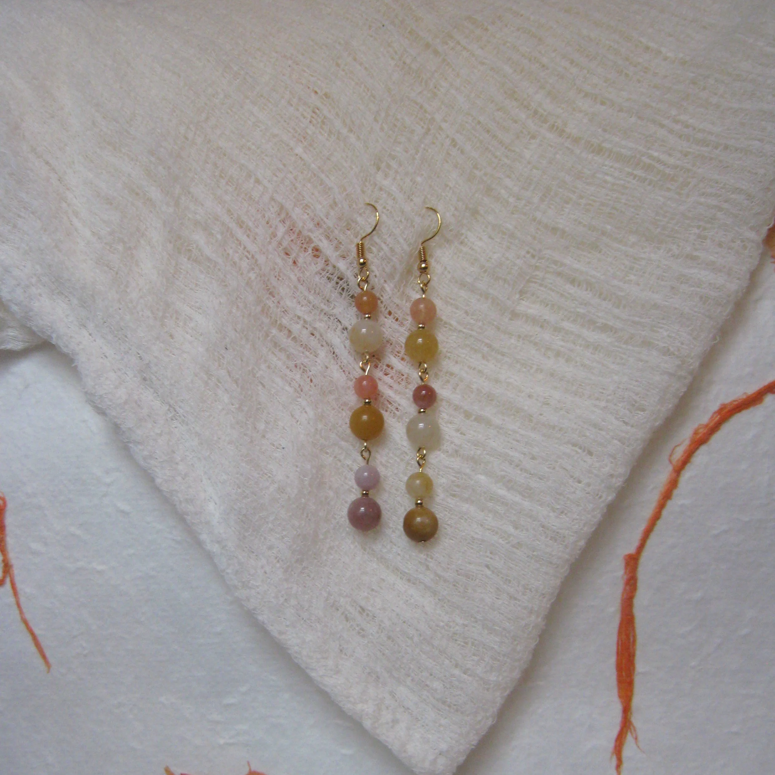 Yellow Light Imperial Jade Dangle Drop Earrings - $12 | Yellow Light Imperial Jade is associated with wealth, prosperity, and joy. It is a stone of optimism and light. In certain cultures, it can represent good fortune, loyalty, and enhance concentra