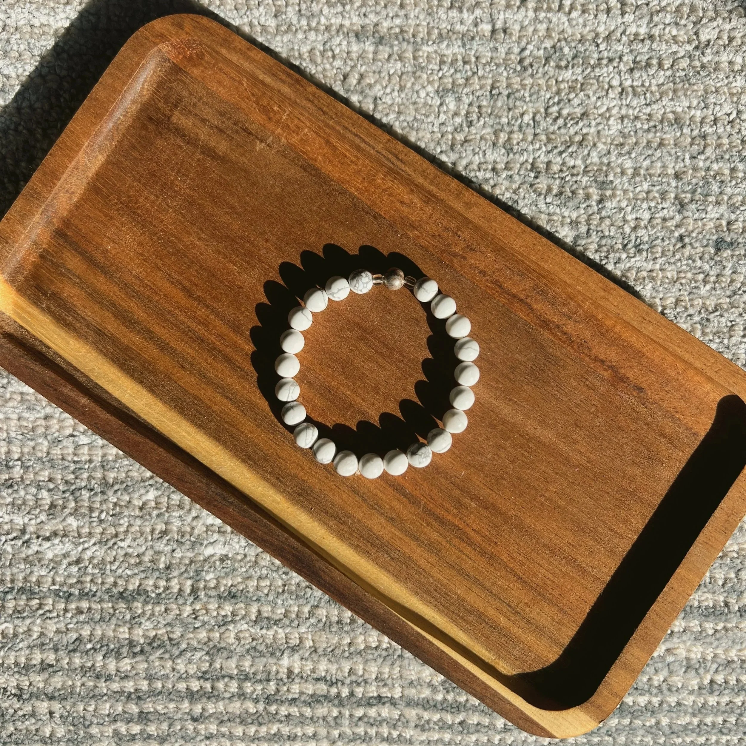 Howlite Seamless Bracelet - $18 |  Howlite is a unique stone of transformation. Rather than allowing your gut instincts to take over, Howlite encourages you to take a step back to reflect. Ruled by the calming energy of Mother Earth, the stone is inc