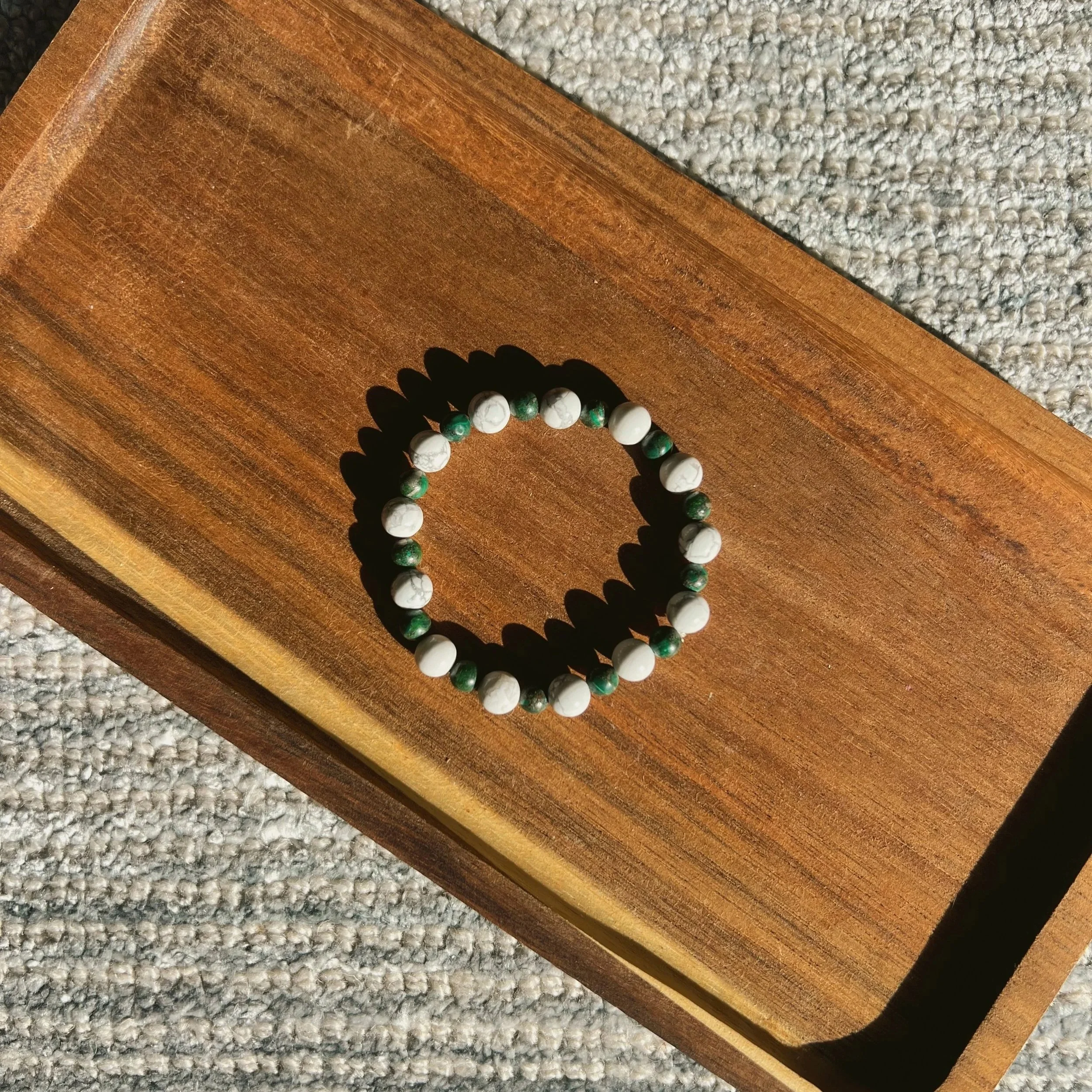Howlite & Malachite Seamless Bracelet - $18 |  Howlite encourages you to take a step back and reflect. It is a unique transformation stone known for providing patience, mindfulness, and introspection. Malachite symbolizes personal growth and positive