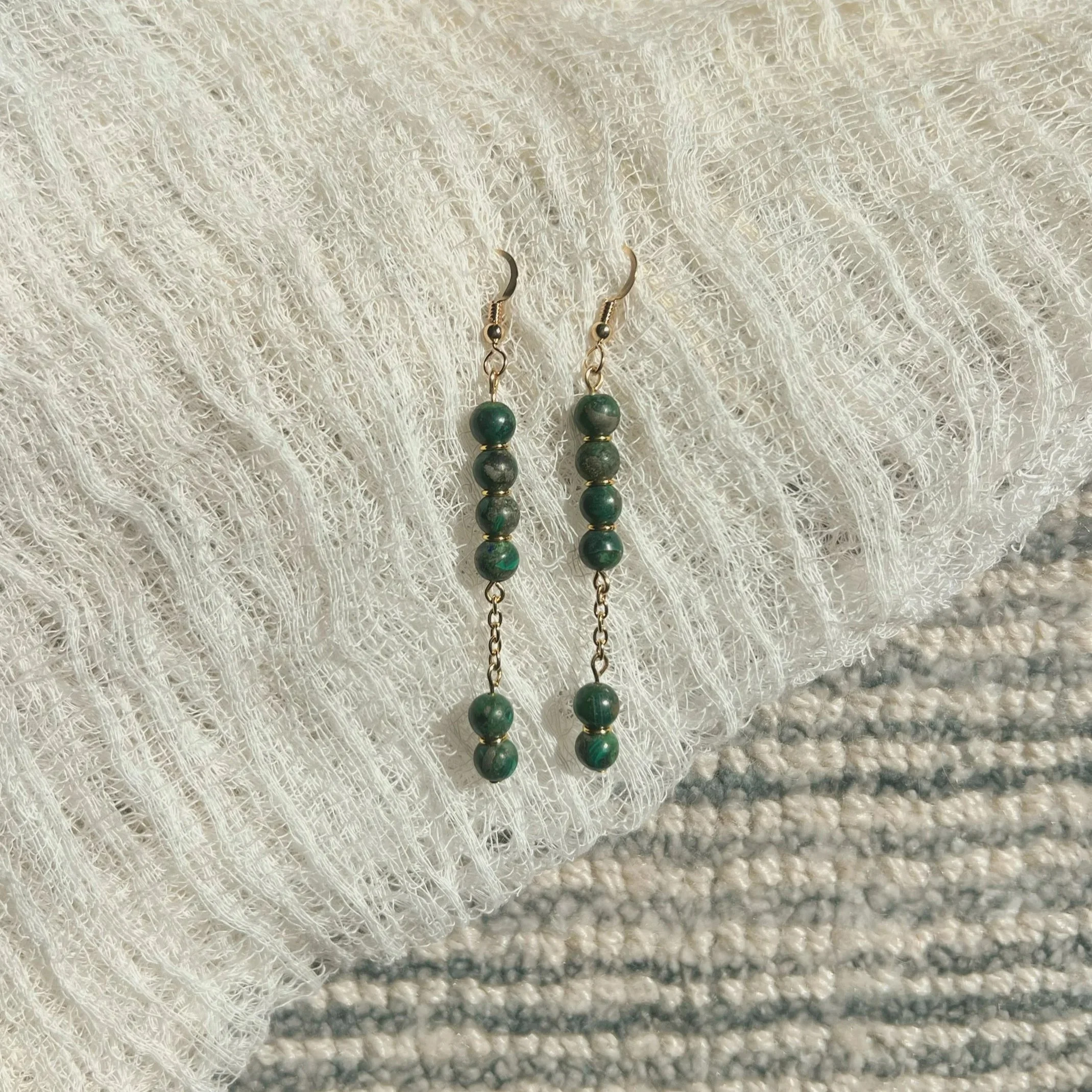 Malachite Stack Drop Earrings - $12 |  Malachite is another stone of transformation, symbolizing personal growth and positive change. It is known for its deep healing properties, assisting in emotional and physical renewal. It allows you to break unw