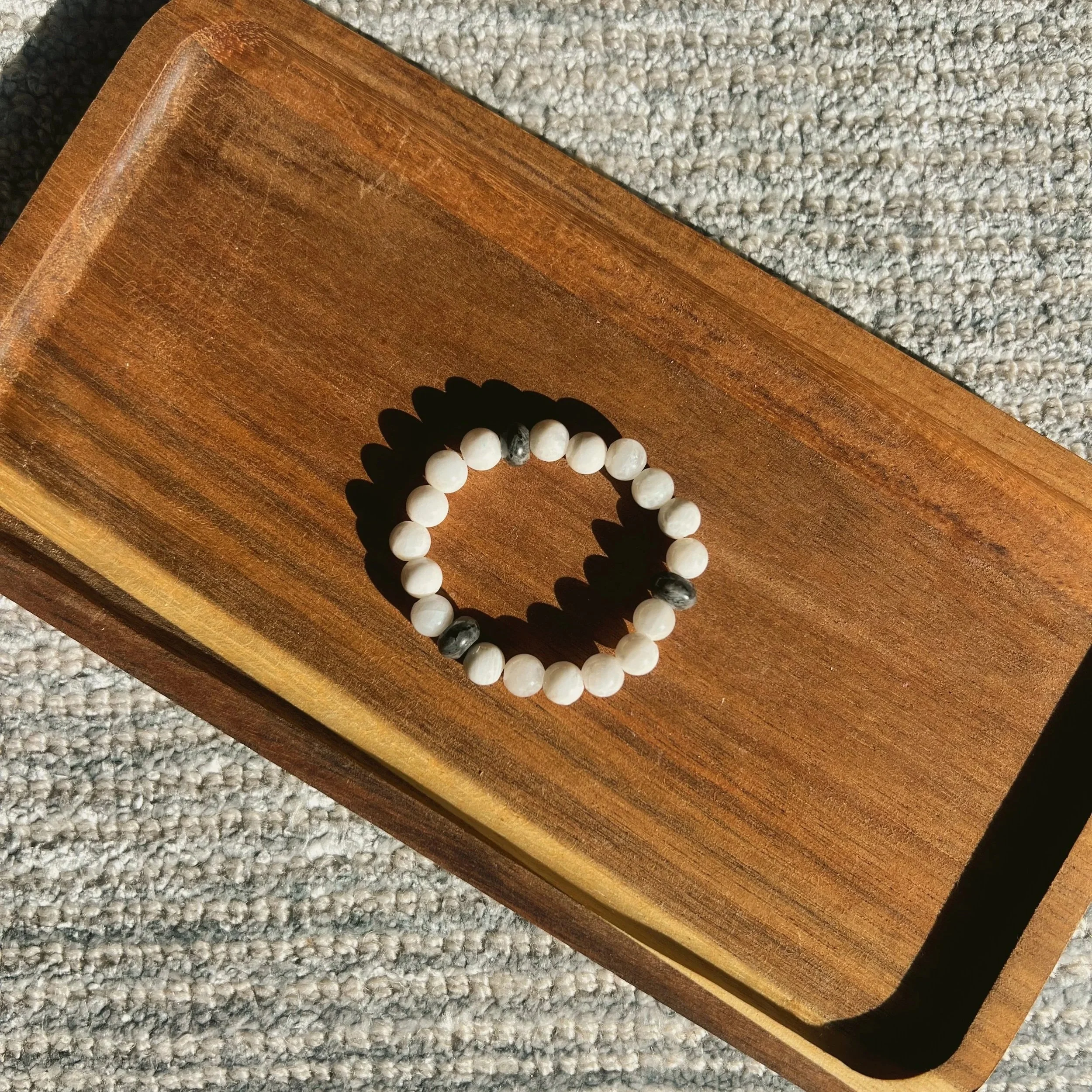 Moonstone & Labradorite Seamless Bracelet - $18 |  Moonstone symbolizes new beginnings, intuition, and emotional balance. It encourages us to be open and understanding towards others, reminding us that change is a part of life. Labradorite protects t