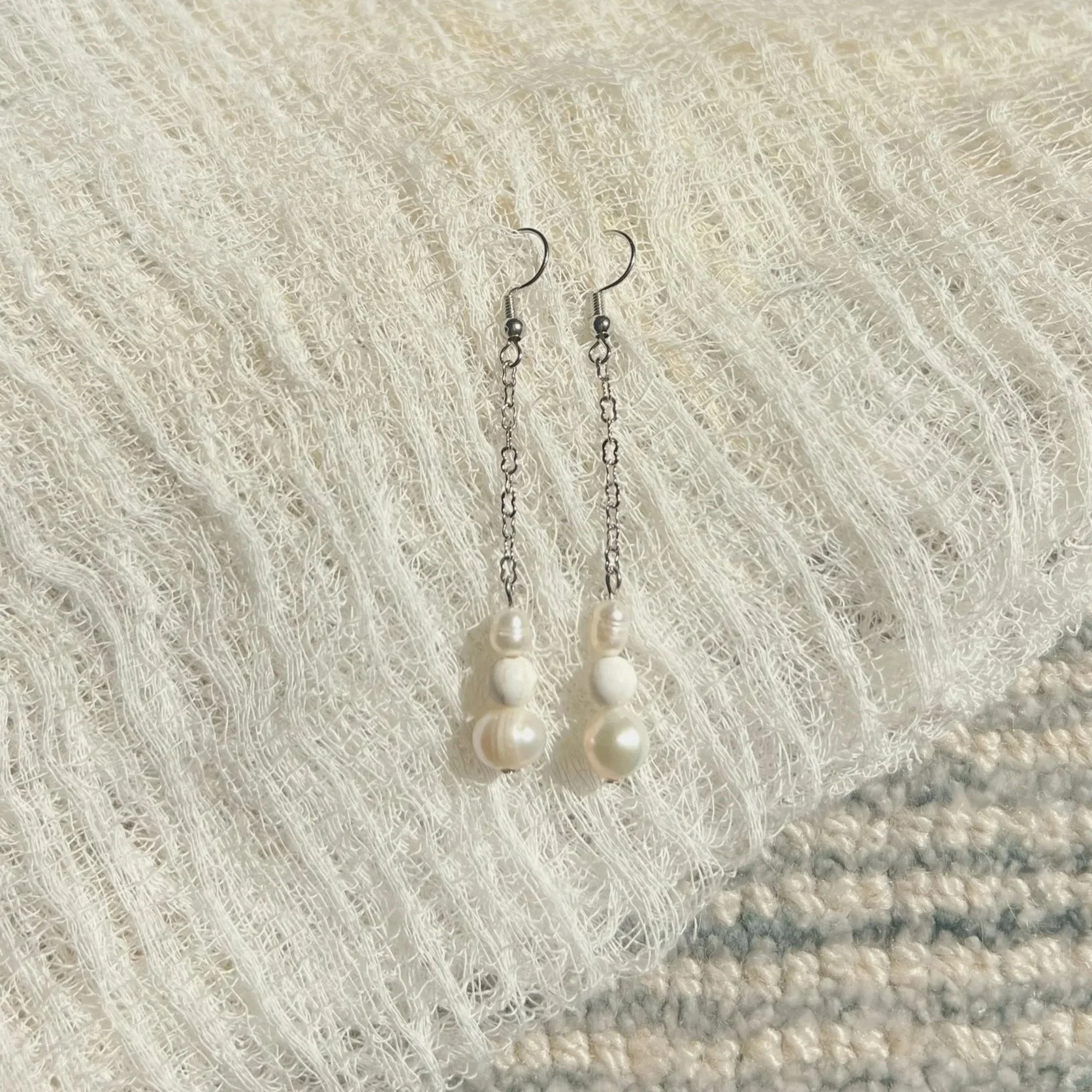 Mother of Pearl Dangle Earrings (silver finish) - $12 |  Cultured pearls are often associated with purity, wisdom, and spiritual growth. Mother of Pearl is known for its soothing and nurturing qualities, which can help reduce stress and anxiety. The 