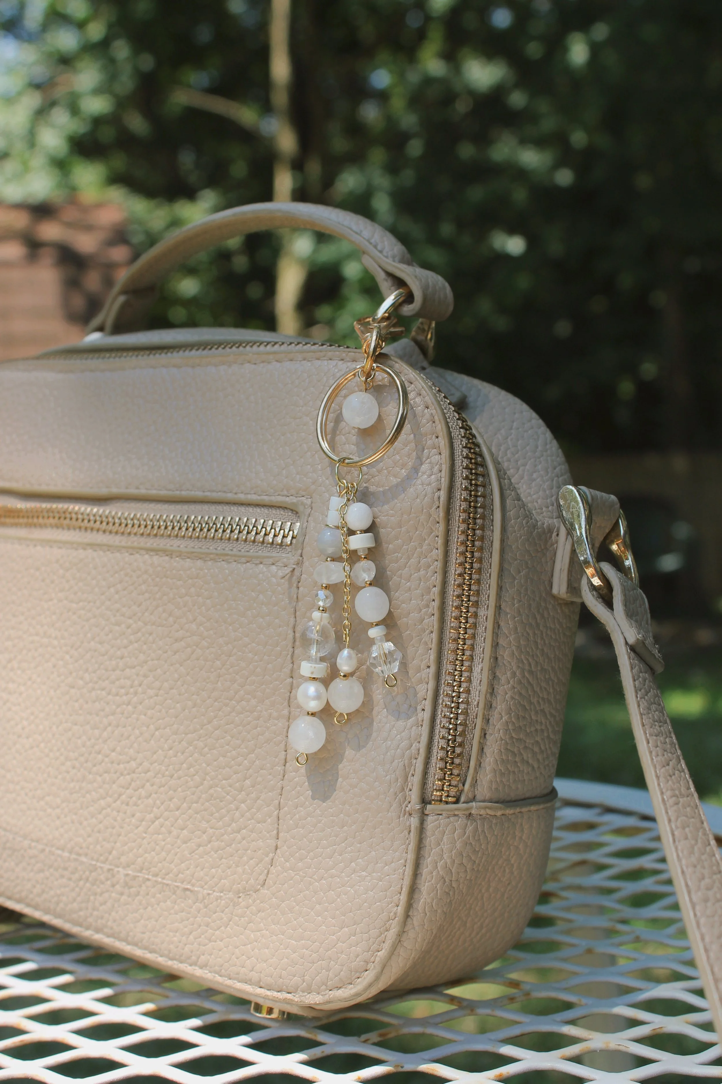  "Crystal Clear Clouds" Bag Charm in Gold Finishings -$20 | Stones: White Quartz, Clear Quartz, Uncultured Pearl, Howlite