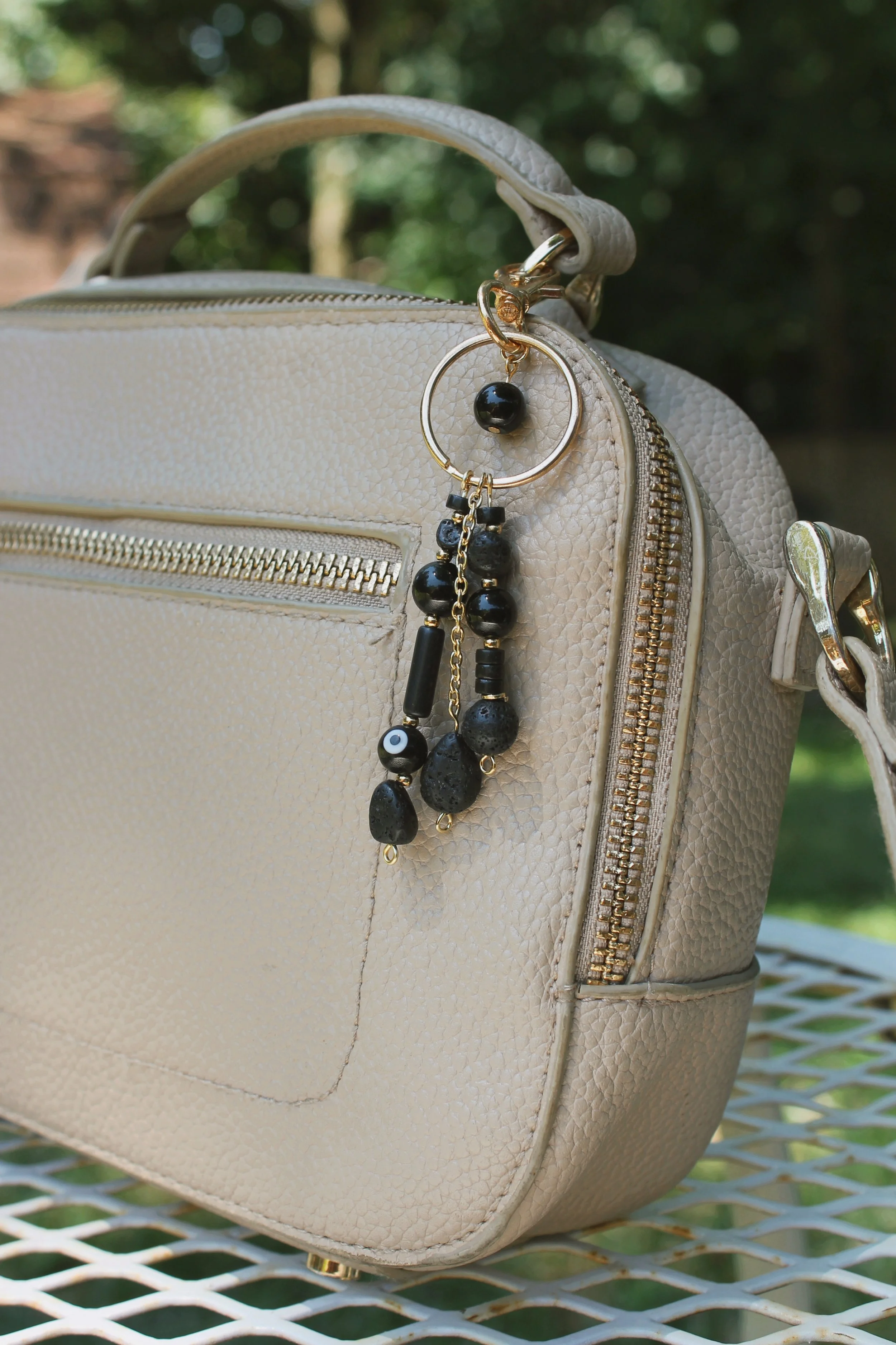 "Moonless Sky" Bag Charm in Gold Finishings - $20 | Stones: Black Jasper, Lava Chips