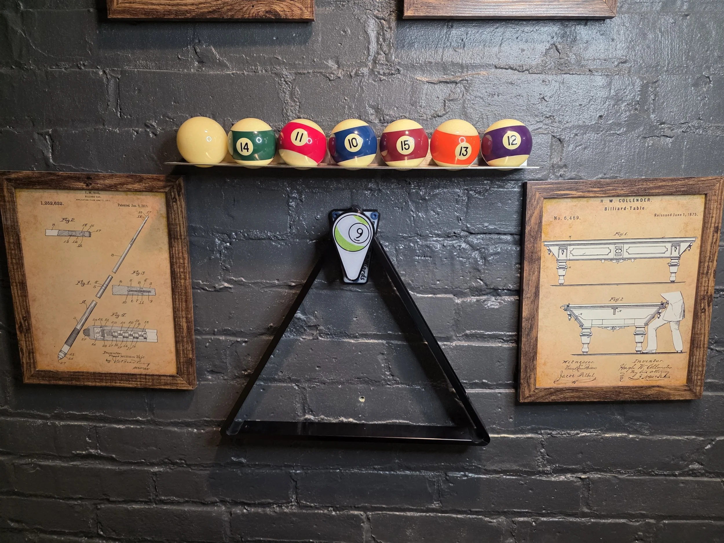 Wall mounted billiards rack holder. 8 ball and 9 ball.