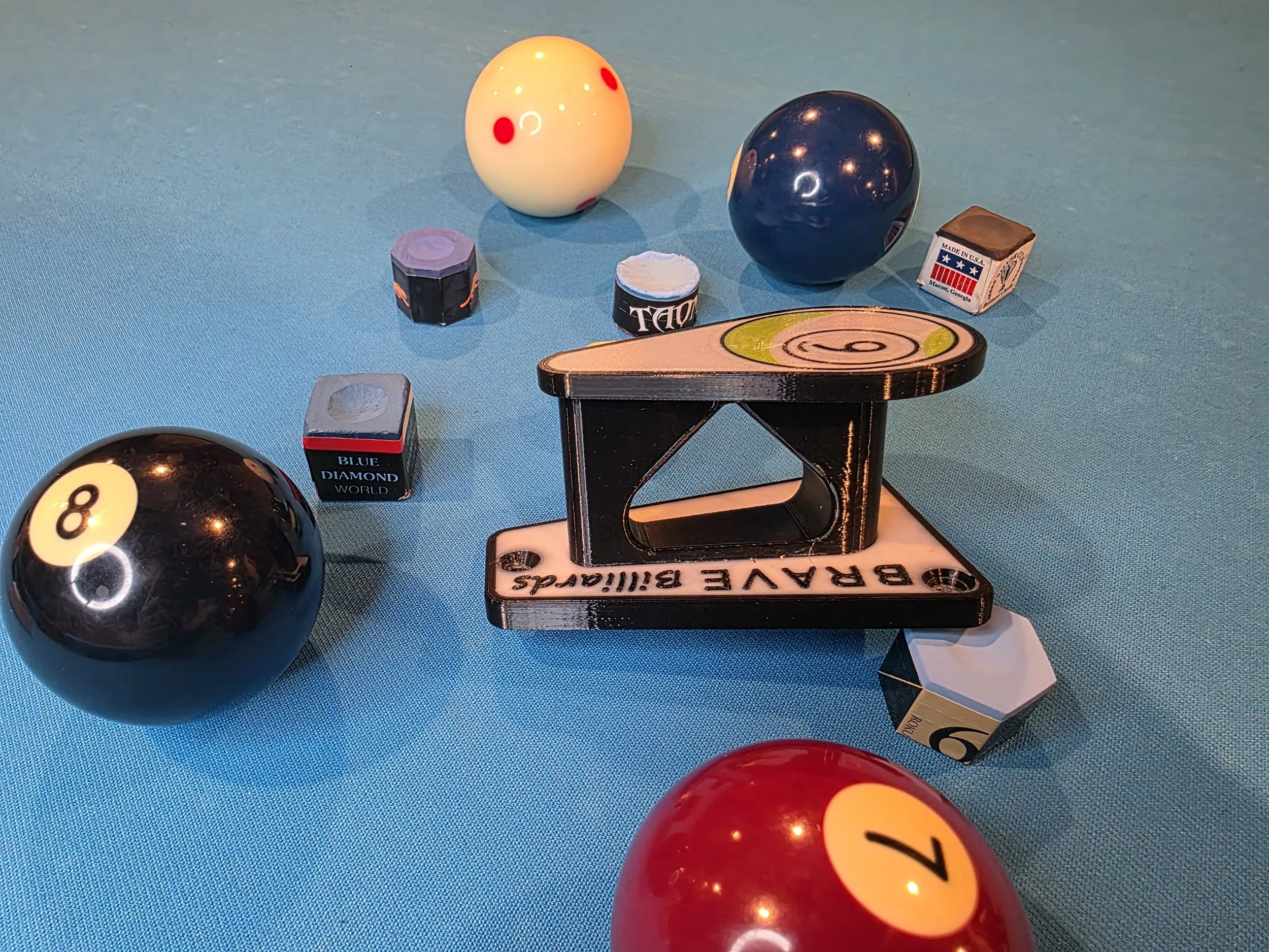 Wall mounted billiards rack holder. 8 ball and 9 ball.