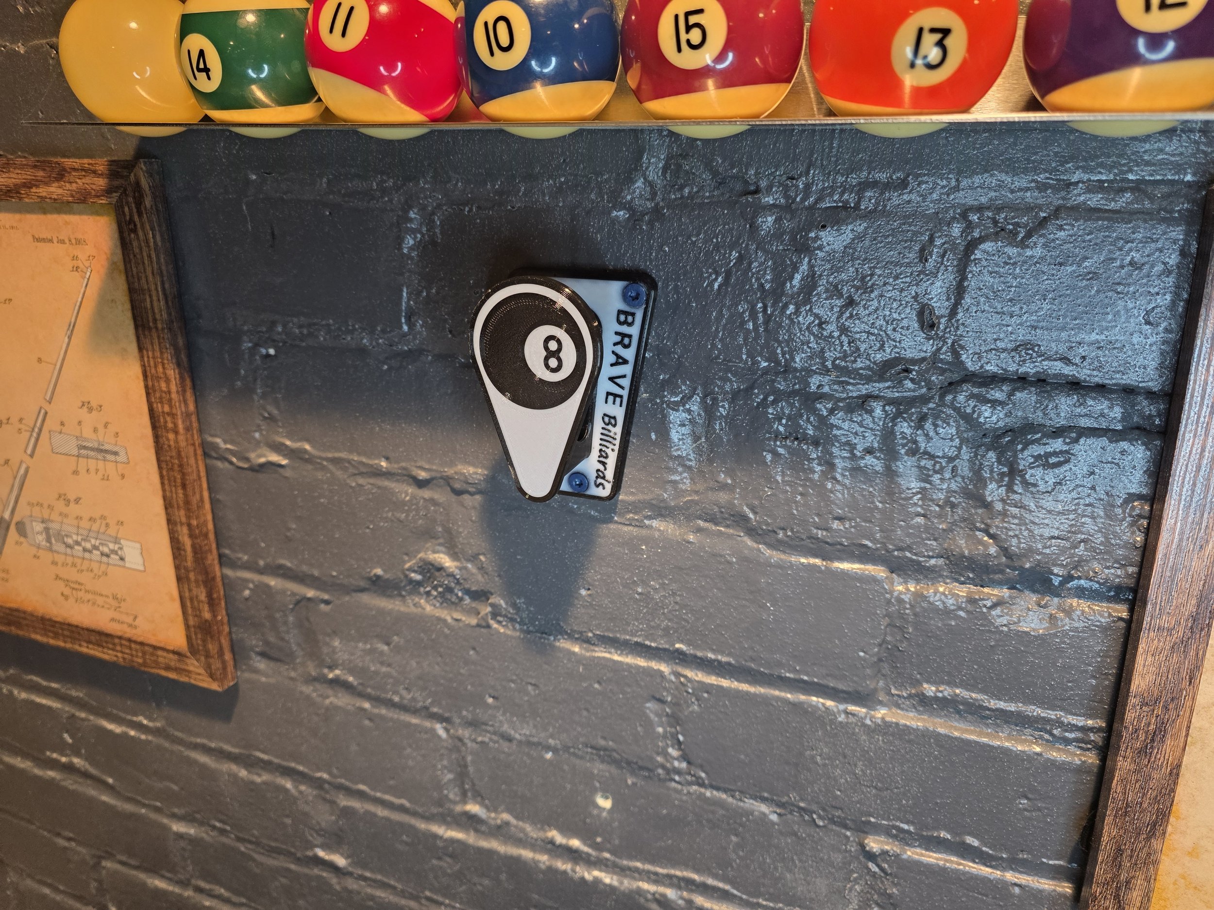 Wall mounted billiards rack holder. 8 ball and 9 ball.