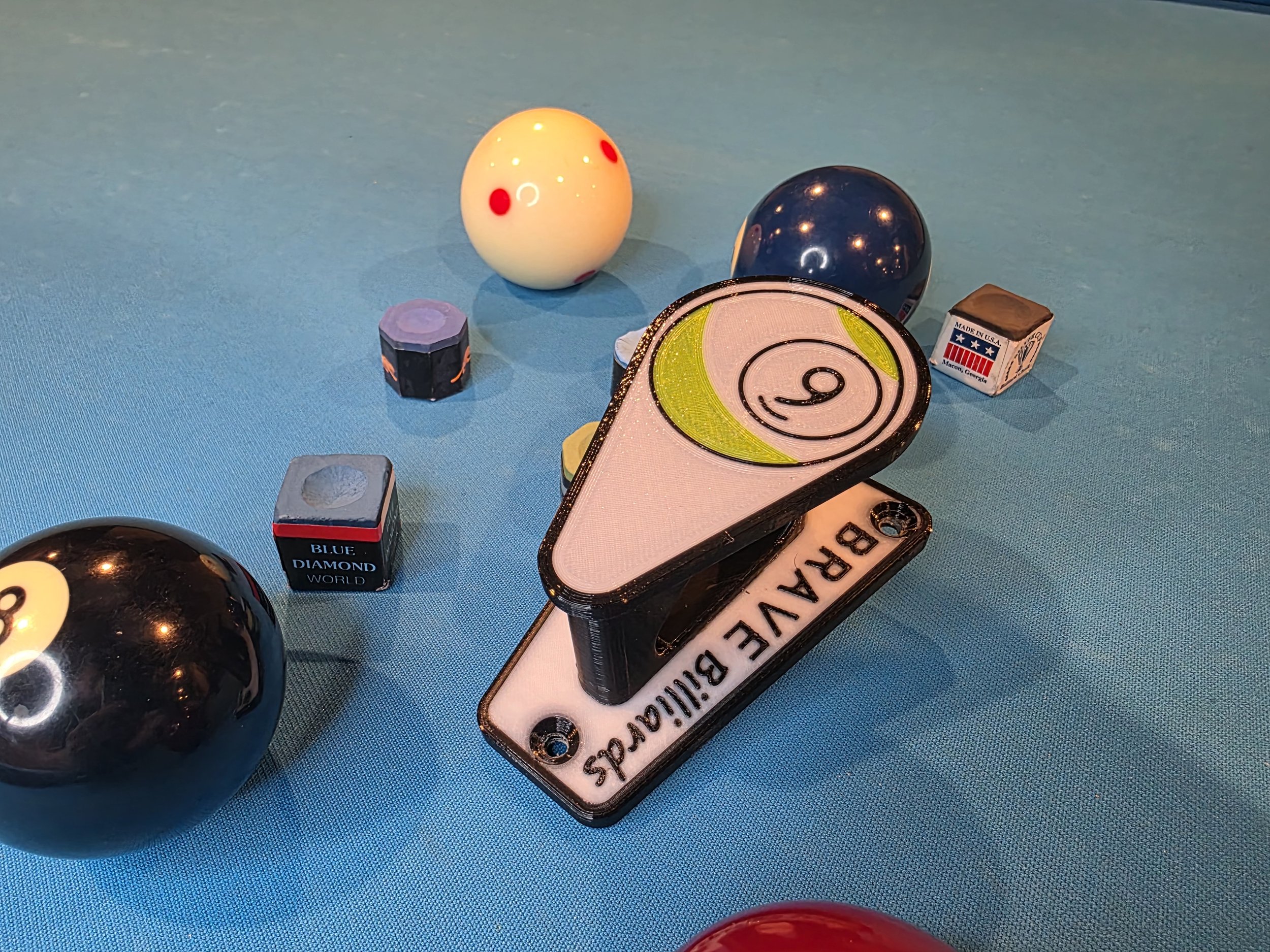 Wall mounted billiards rack holder. 8 ball and 9 ball.