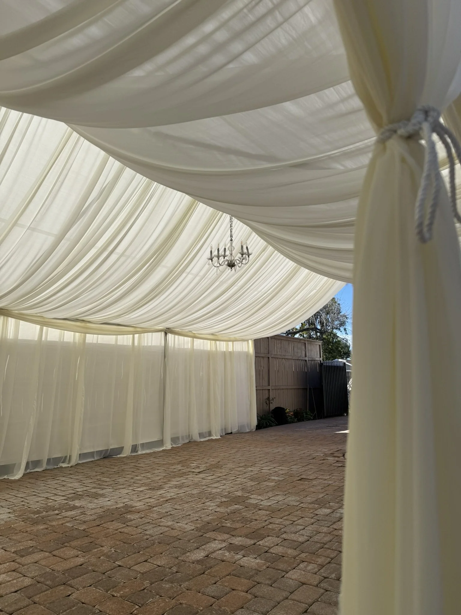 20x30 fully draped w/ cream