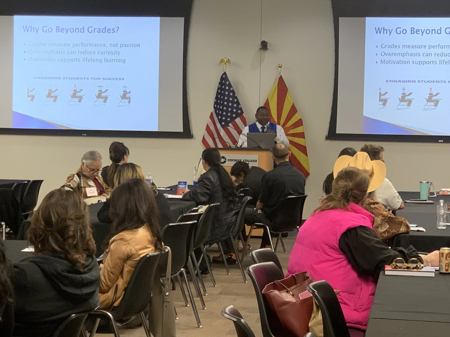 Dr. Neal presenting to an audience in a classroom