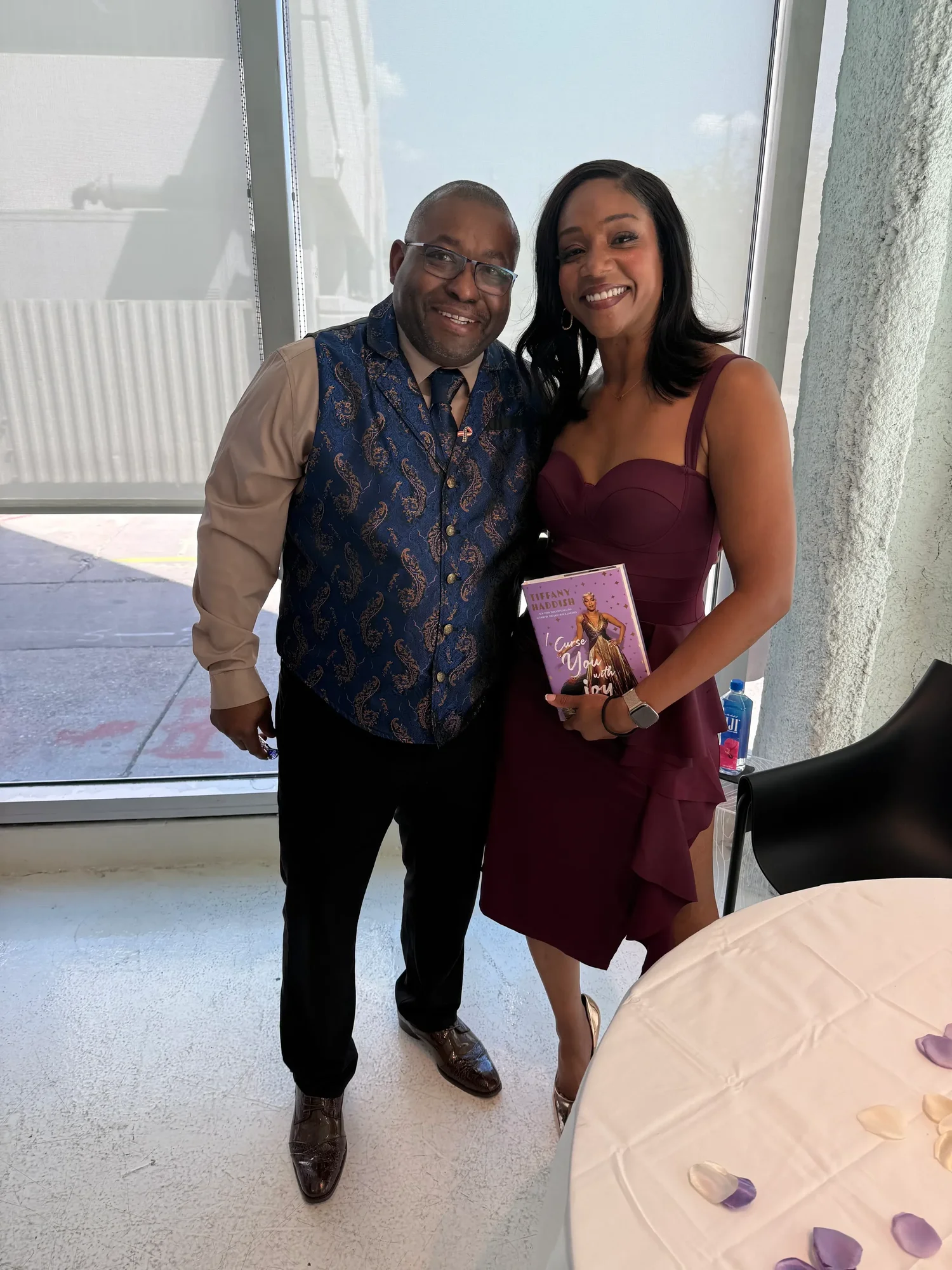 Dr. Neal and a woman posing together at an event