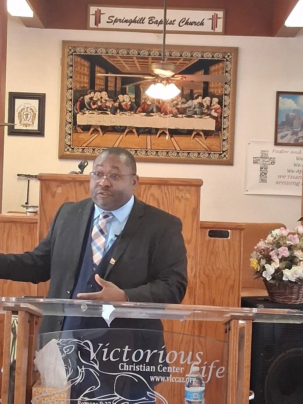 Dr. Neal speaking from a church lectern