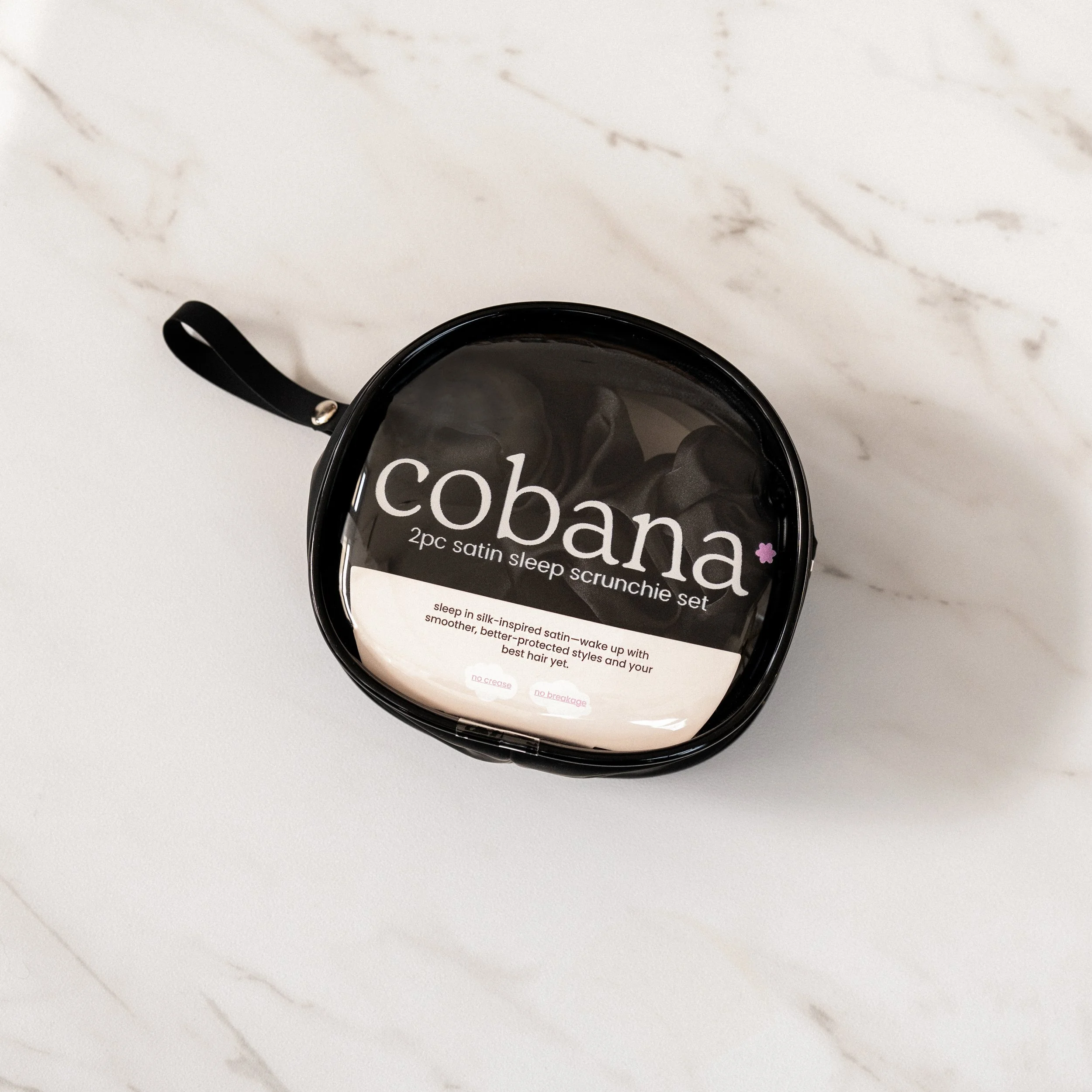 Hair accessories product photography on stone backdrop, packaging product photography Los Angele