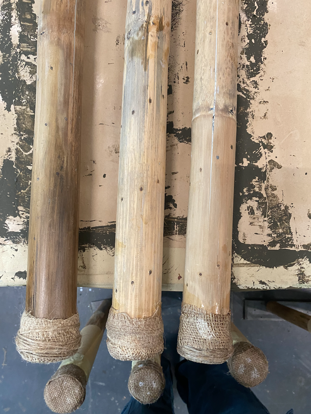 These rain sticks serve as another clue in the game Ruins. Since magnets were placed at each end, our team needed to find a discreet way to conceal them. Initially, we used epoxy dough to cover the magnets and painted over them, but the dough kept cr